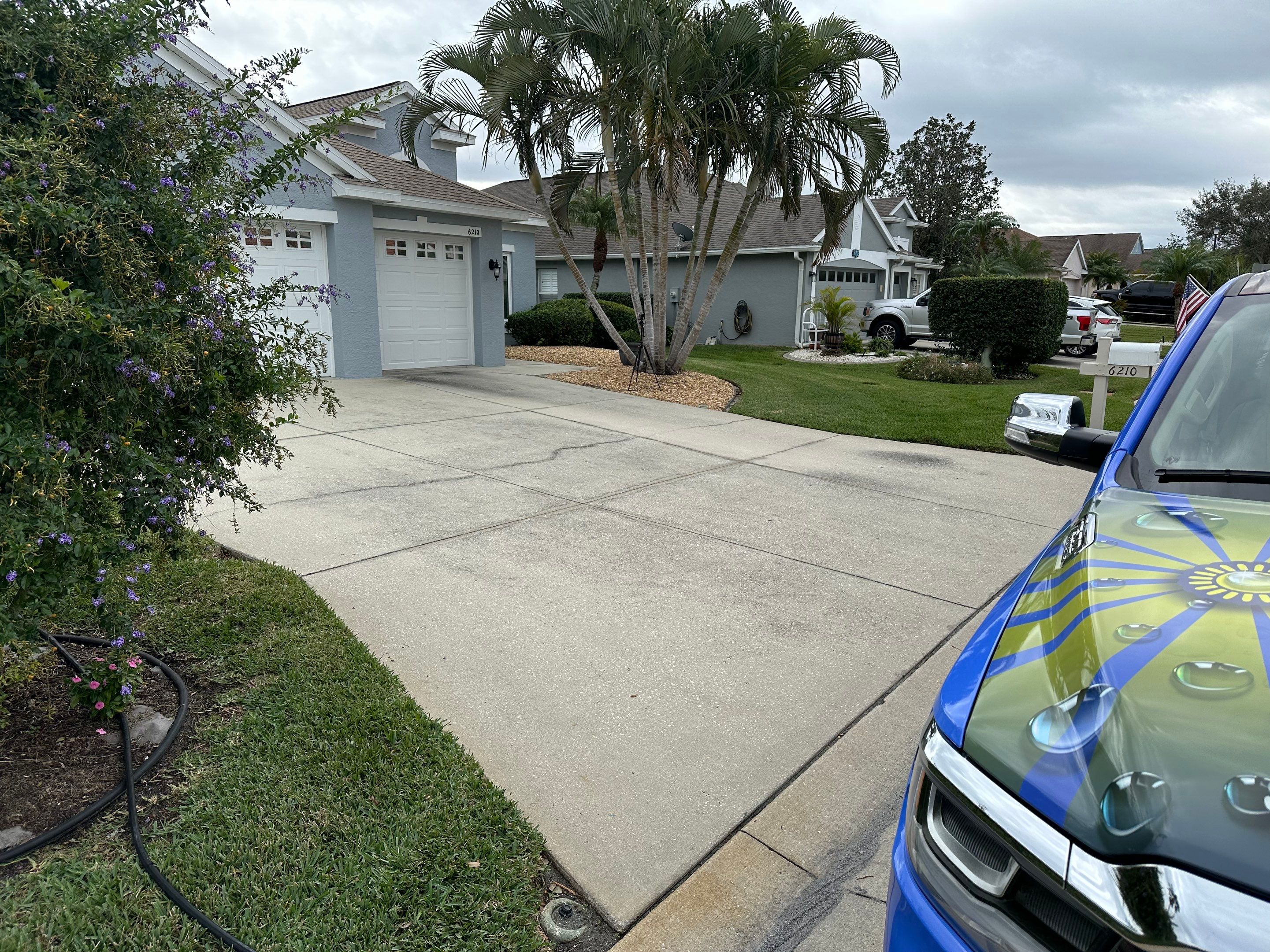 Concrete Driveway, Entryway & Street Curbing Cleaning in Fairways at Imperial Lakes, Palmetto, FL | Sunshine AquaWash by Sunshine AquaWash