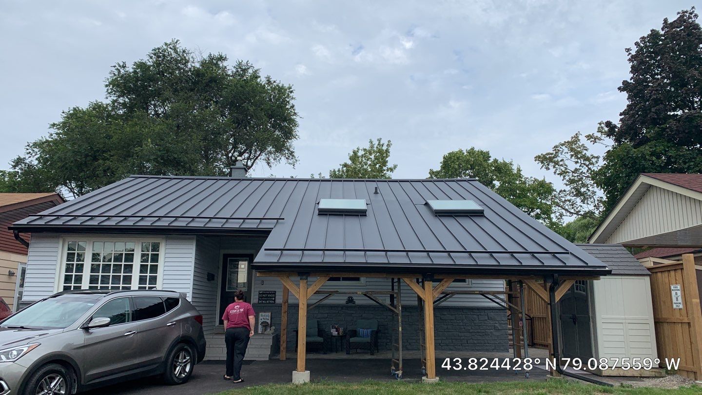 Residential Roofing Installation using 16" Standing Seam Panels by Jay Carter Roofing & Sheet Metal