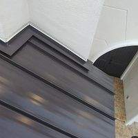 24ga 1.5" Mechanical Seam Dark Bronze by Total Roofing System The Metal Roof Experts