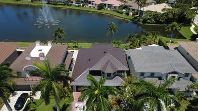 Residential Roofing Installation using 1" Nail strip metal roof