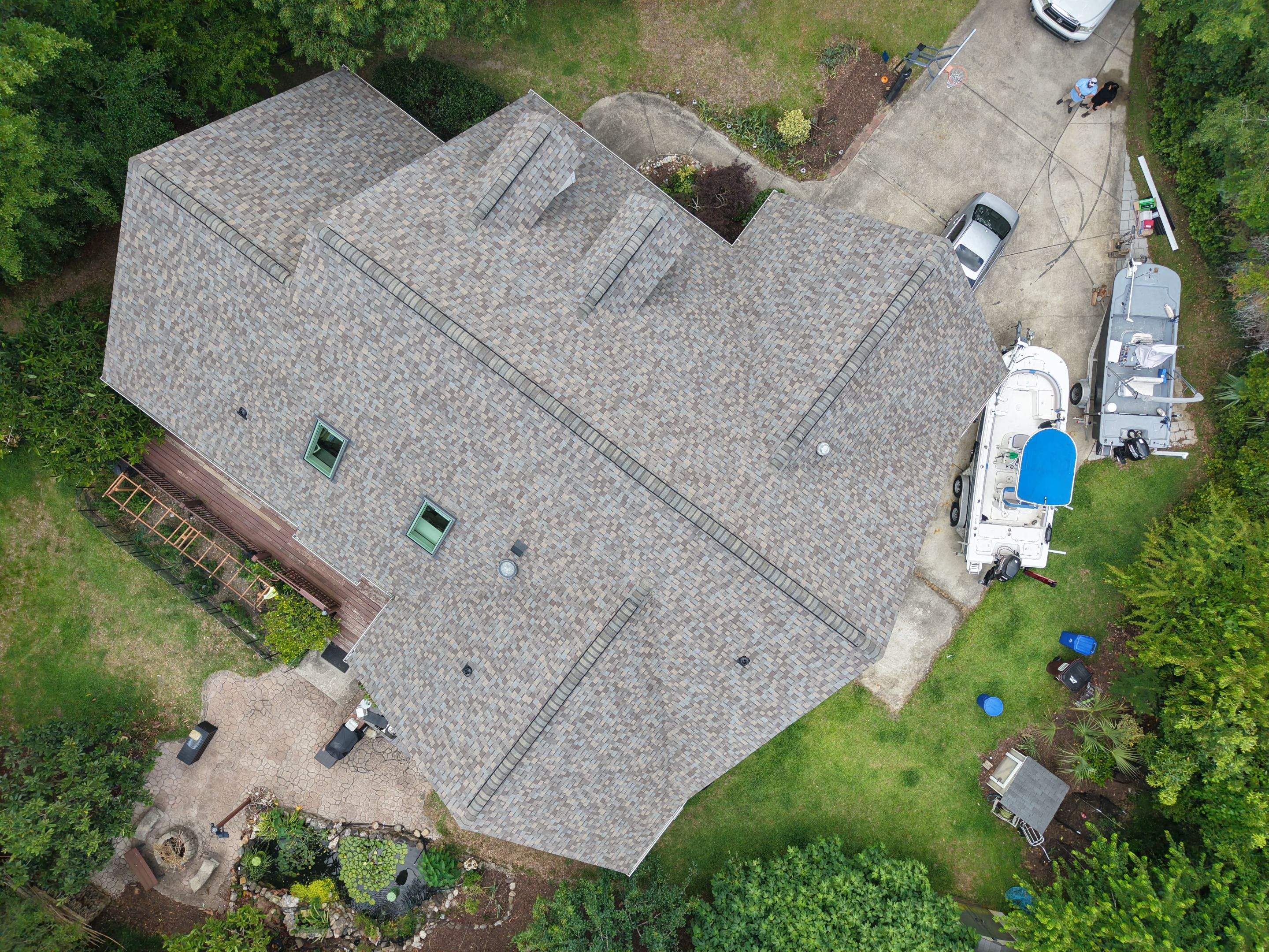 Hampstead FORTIFIED Roof Replacement with Skylight Upgrades by RGR Construction and Roofing, LLC