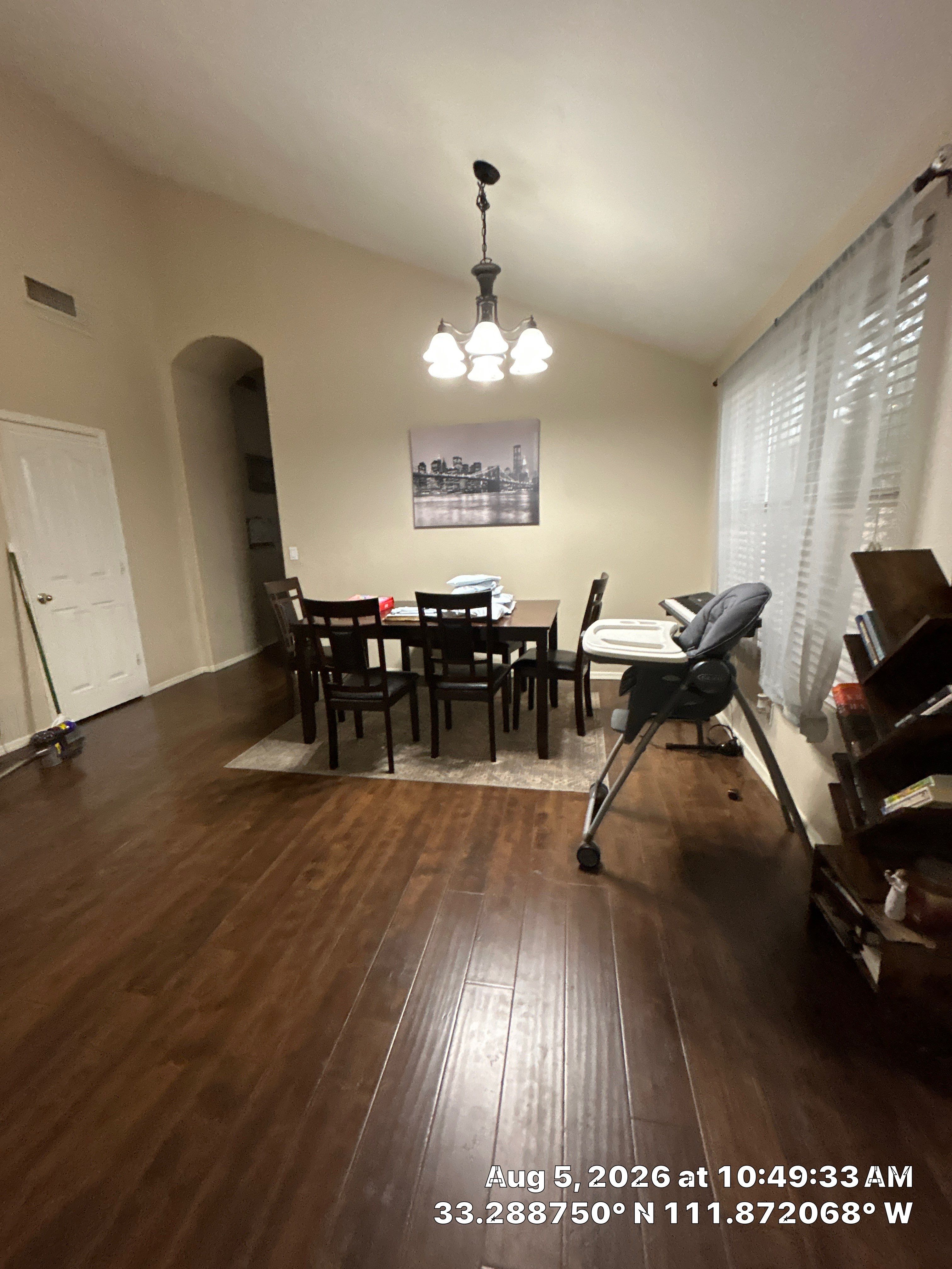 Chandler Dining Room Renovation Featuring New Lighting and Wood-Look Flooring by CompanyCam Sales Demo