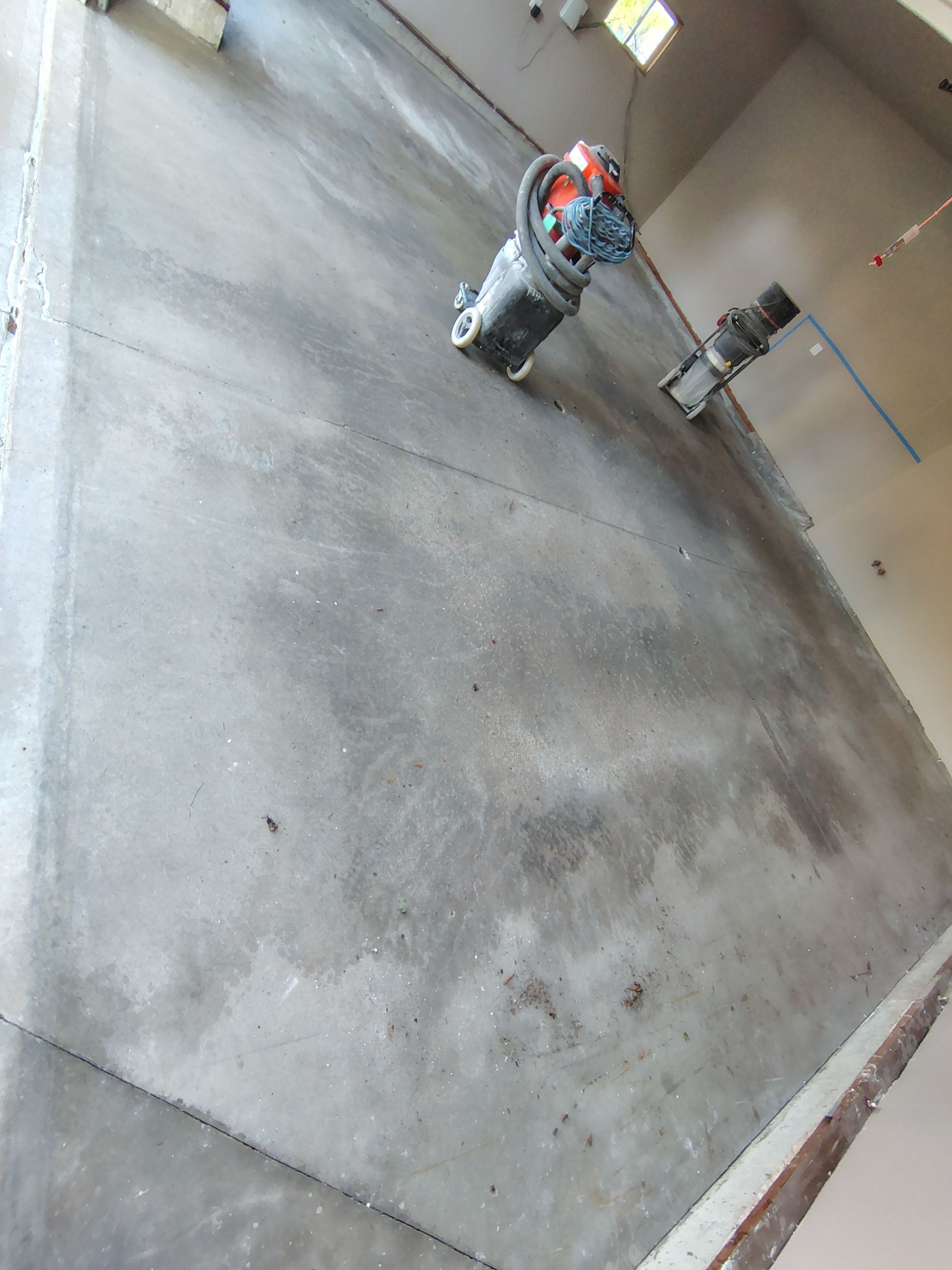 Sioux Falls Garage Concrete Repair and Epoxy Flake Floor Coating by Select Painting, Coatings & Garage Cabinets