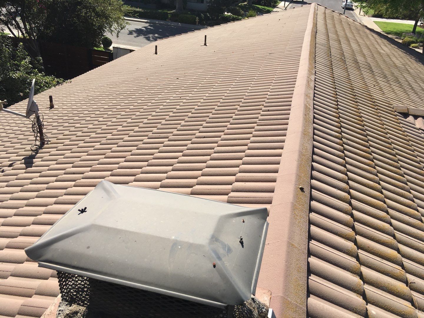 Tile roof remodel/ install OSB sheathing under tile and replace using OSB board with new underlayment, tile, and battens by Straight Edge Roofing Inc