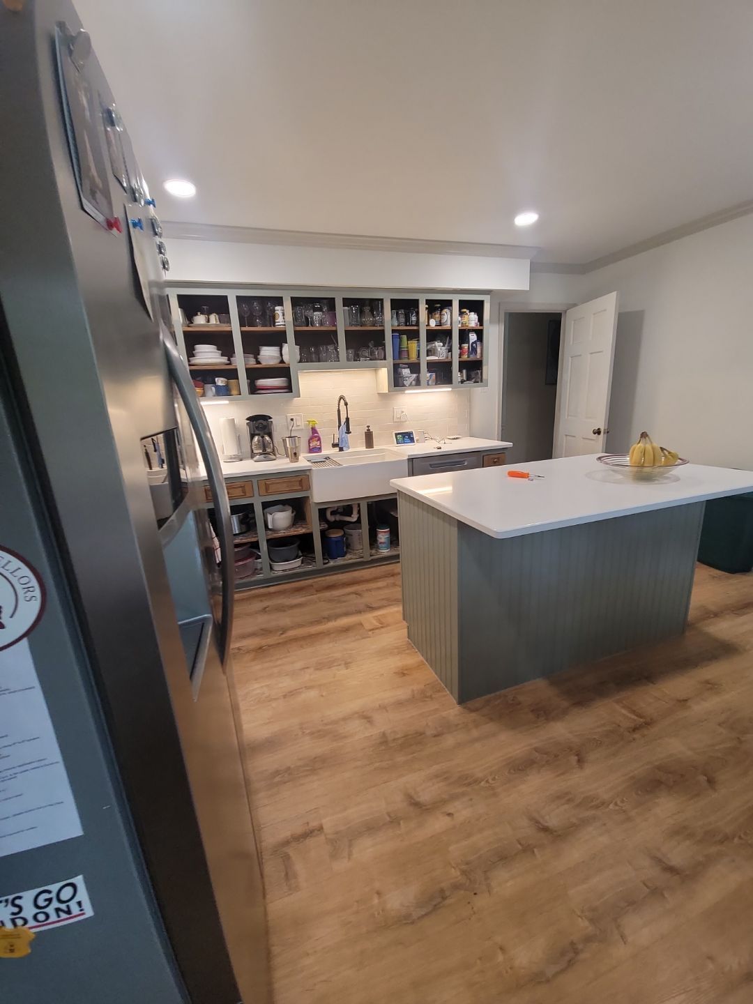 A Pathway to Personality – A Two-Tone Kitchen Transformation in Apex by Elite Remodeling and Design LLC