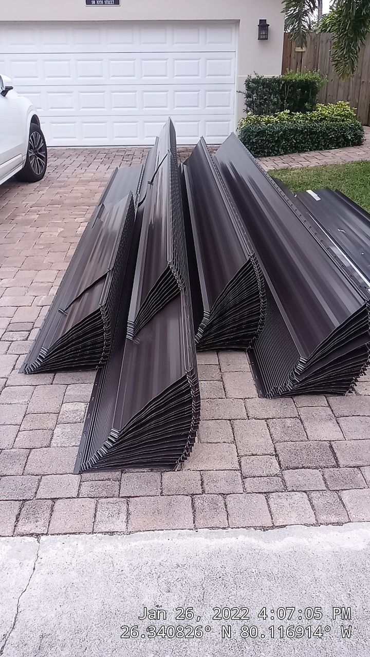 Residential Roofing Installation using 1" Nail strip metal roof by BLUES BROTHERS ROOFING