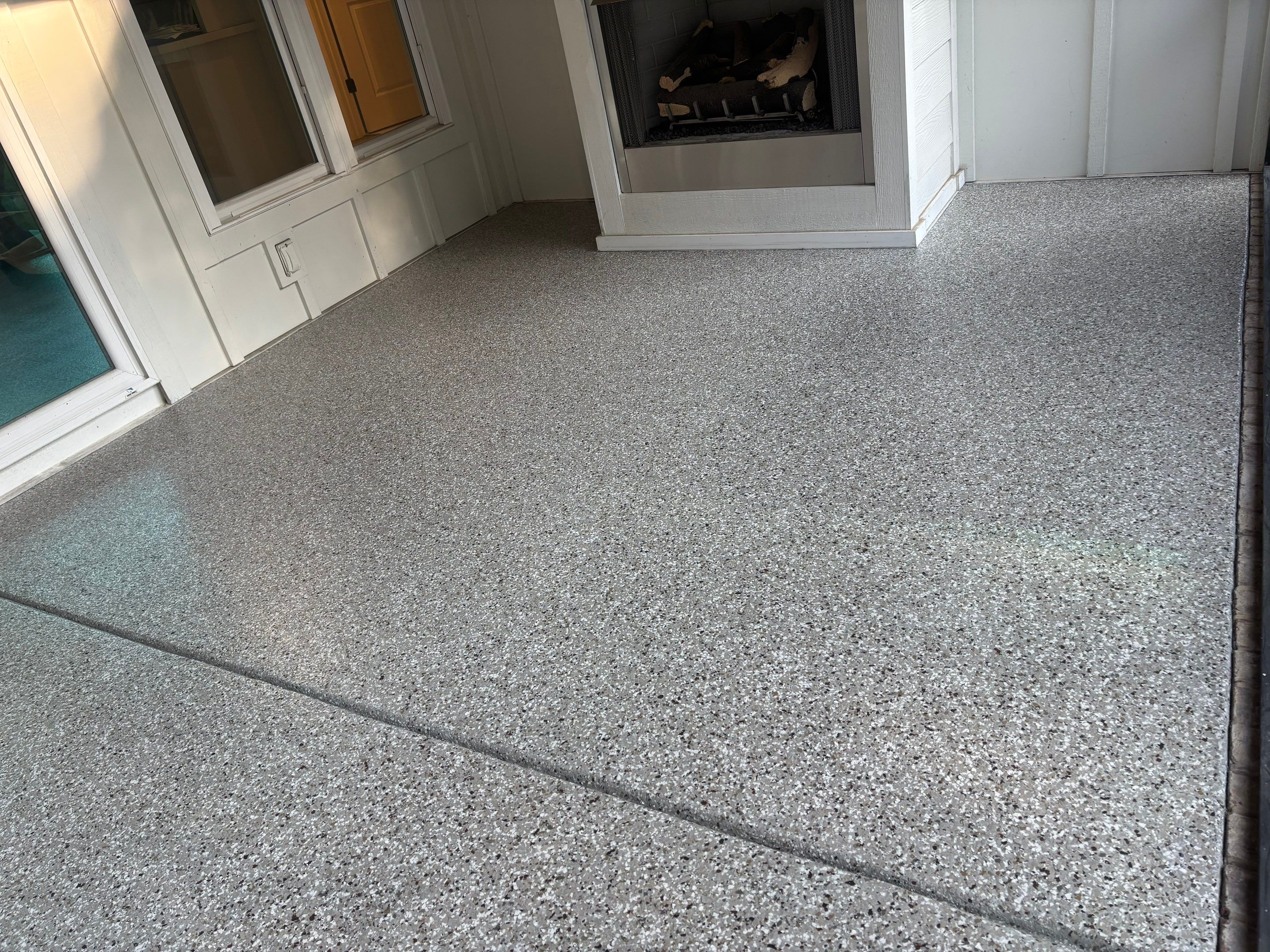 Two Porches Completed Using Creekbed by Elite Floor Solutions
