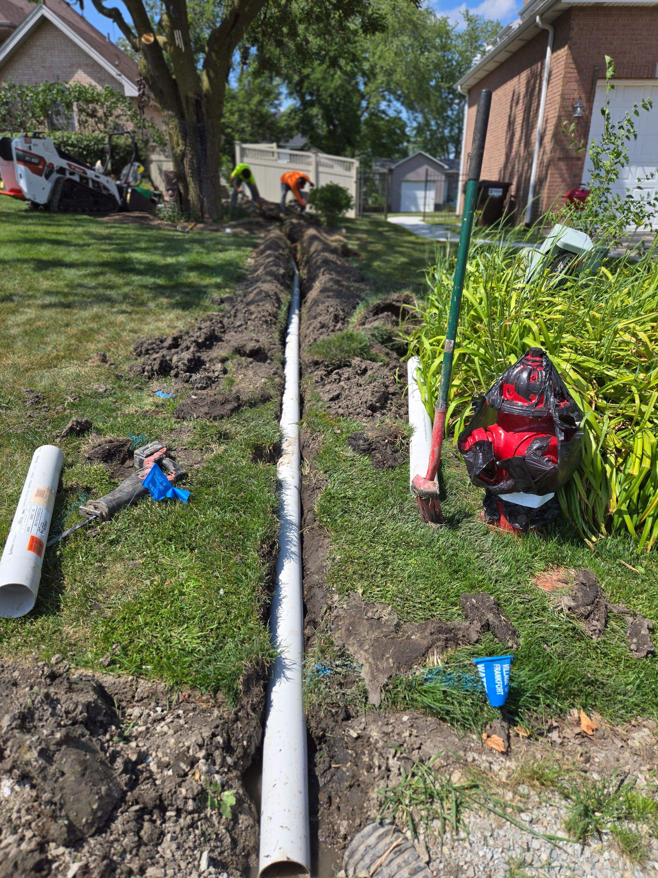 Burial of Sump Pump and Down Spout Discharges and Partial Waterproofing of Wall by Allied Water Services