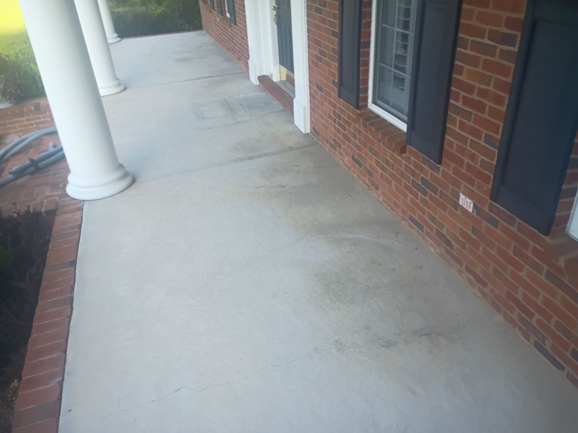Front Porch in Pecan by Cross Creek Concrete Coatings