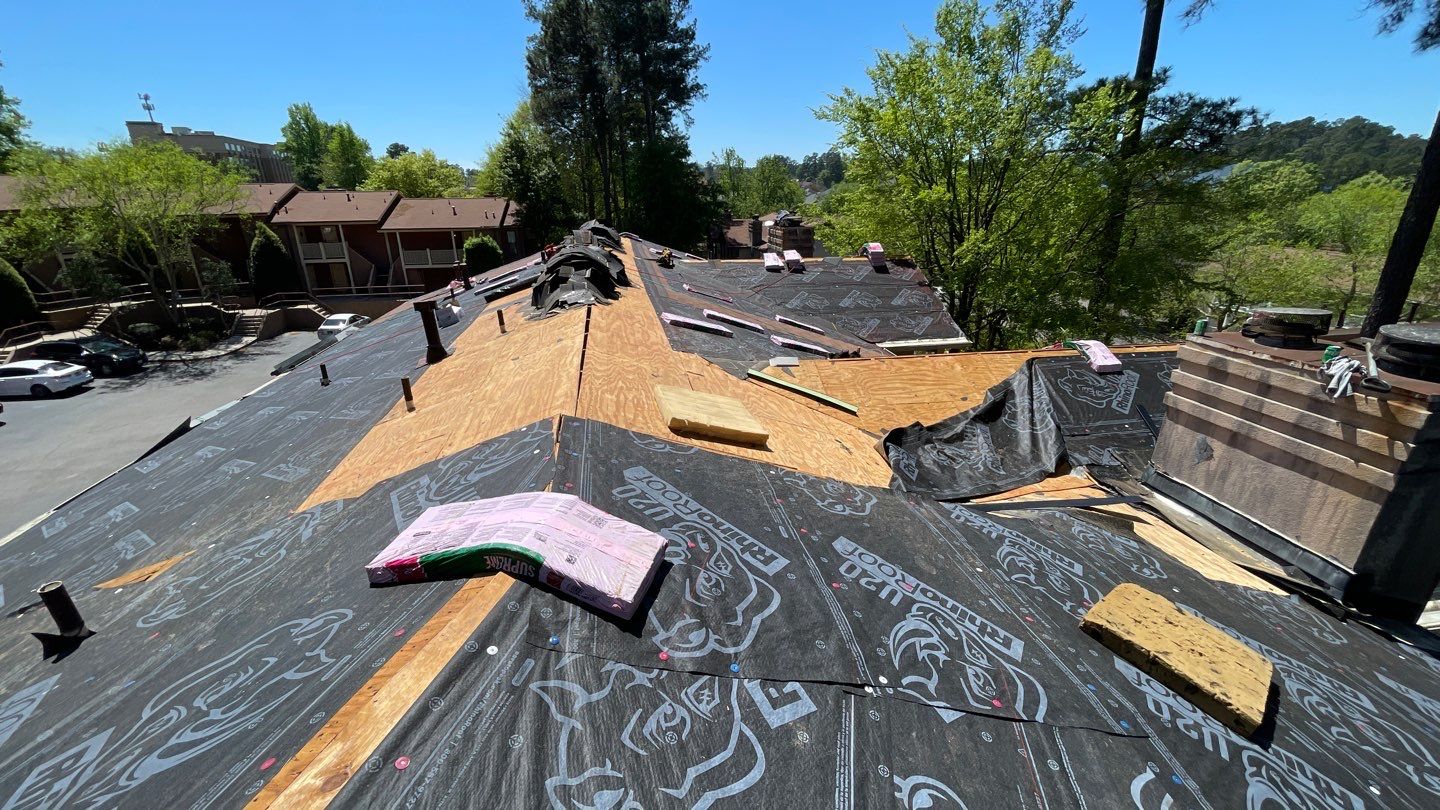 Commercial Roofing Installation using Owens Corning Autumn Brown by Inspector Roofing and Restoration