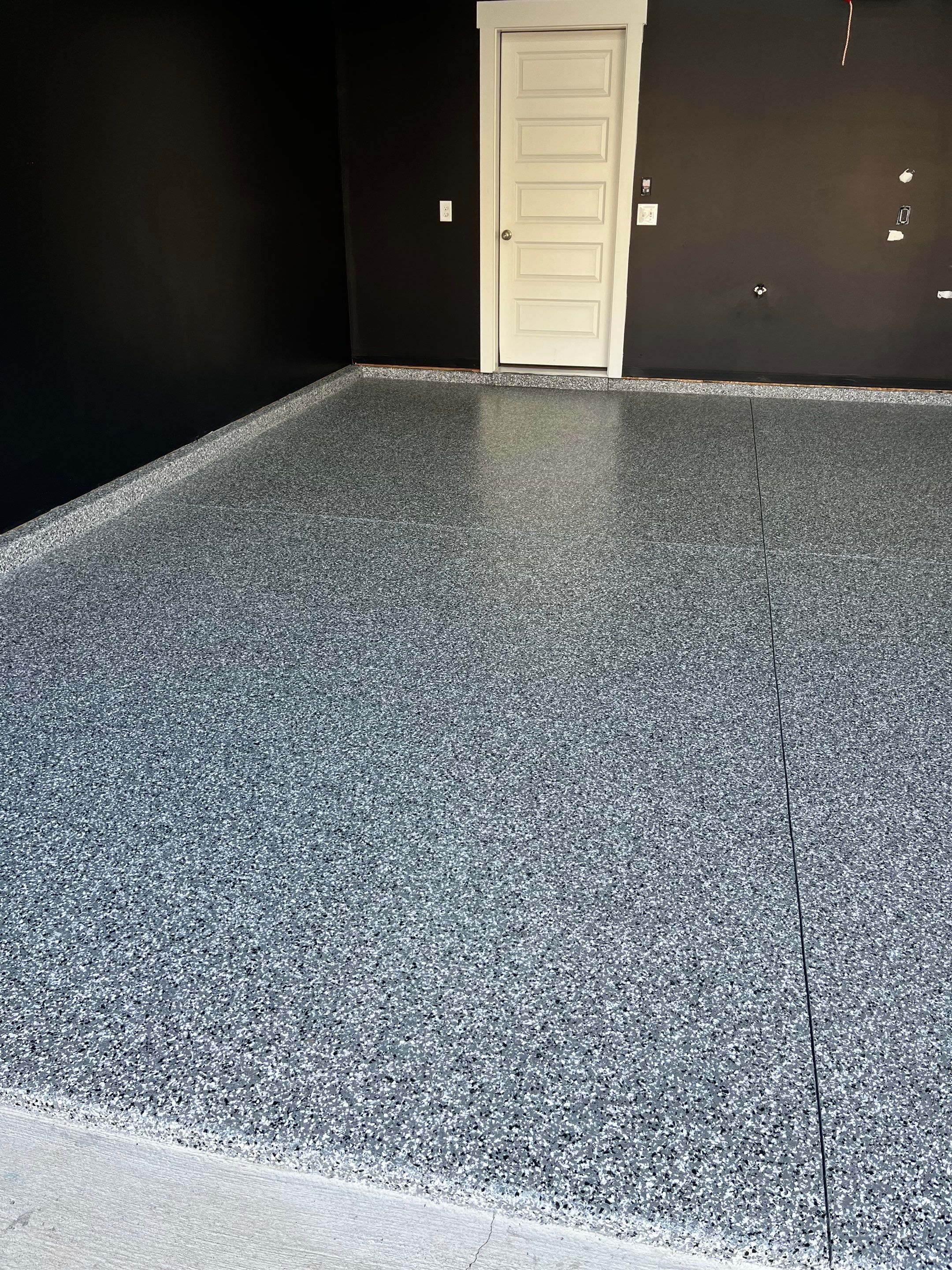 Garage Floor Coating using Wombat by My Garage Floor Guys