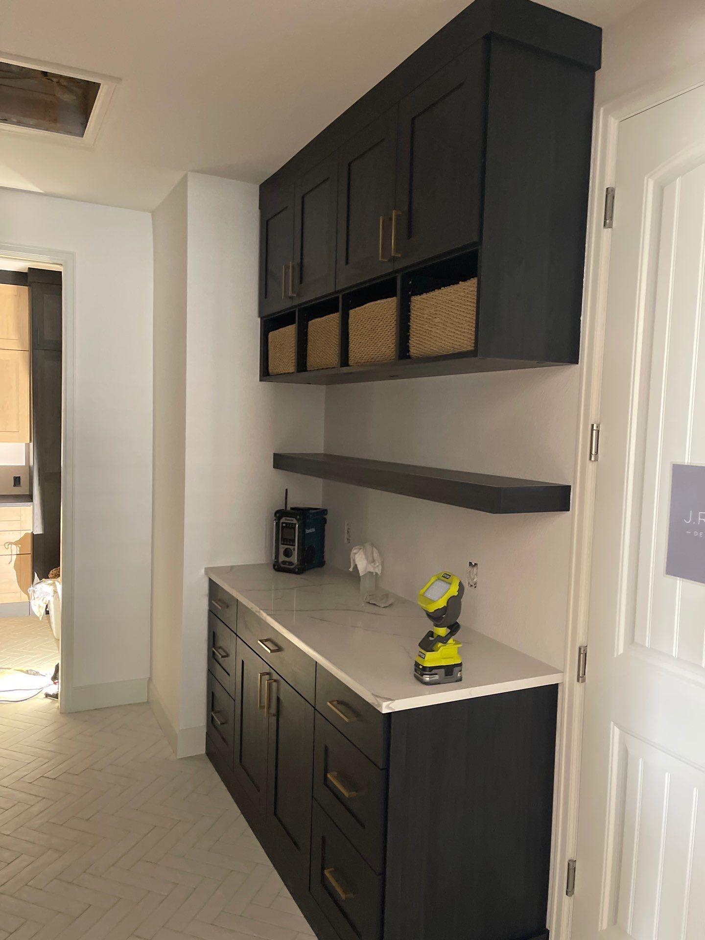 Two-Tone Closet with matching Mudroom + Laundry Room by Concept 32, Inc.