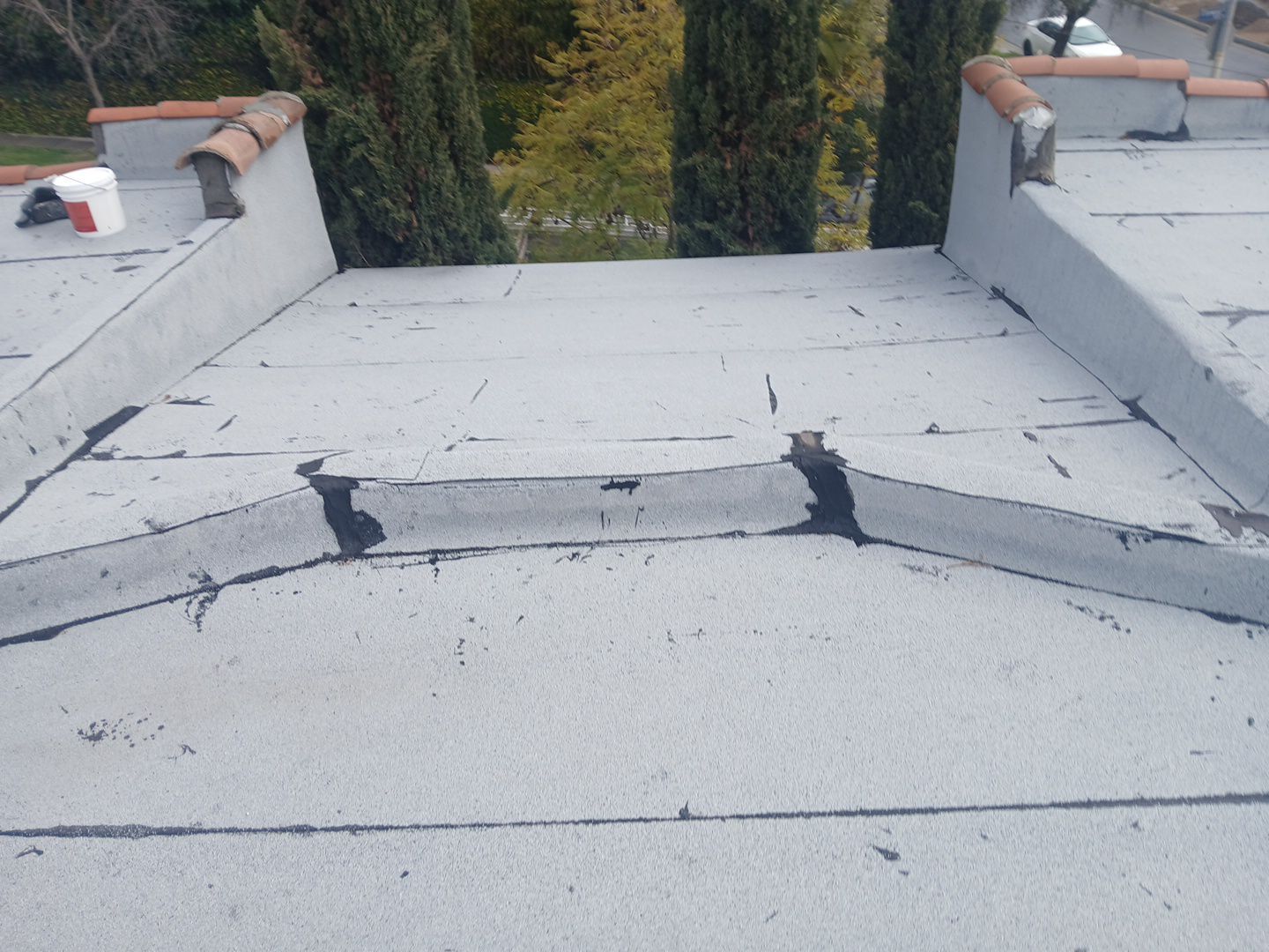 Silicone Membrane Installation using American Standard Coatings Silicone-S by Hull Brothers Roofing