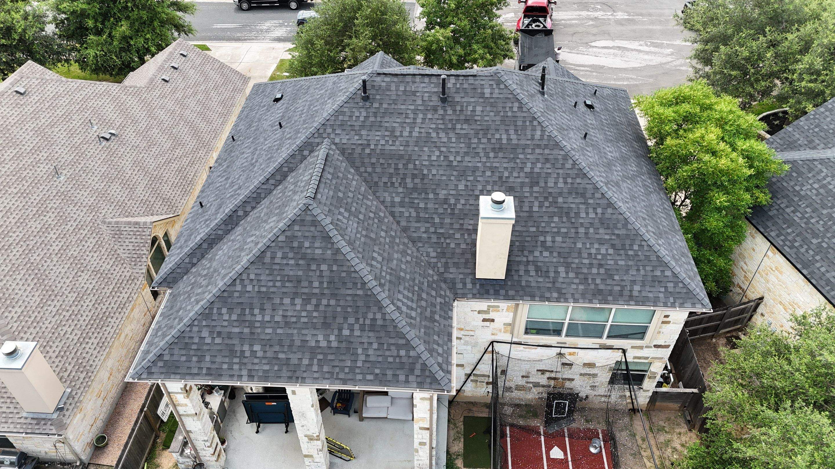 Granite Black Shingles by Perennial Roofing 