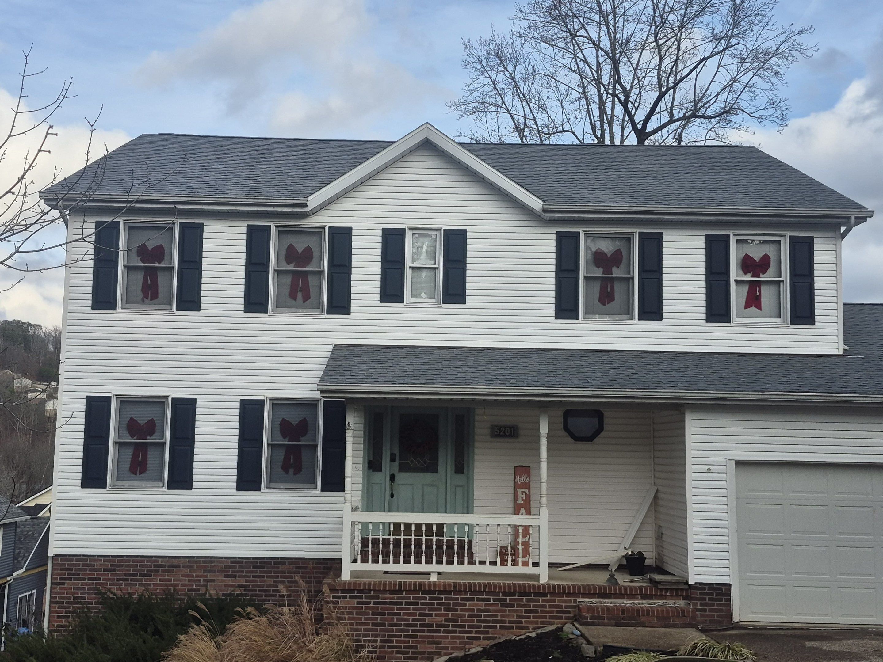 Residential Roofing Installation using GAF Timberline HDZ Oyster Grey by Rainstoppers Roofing