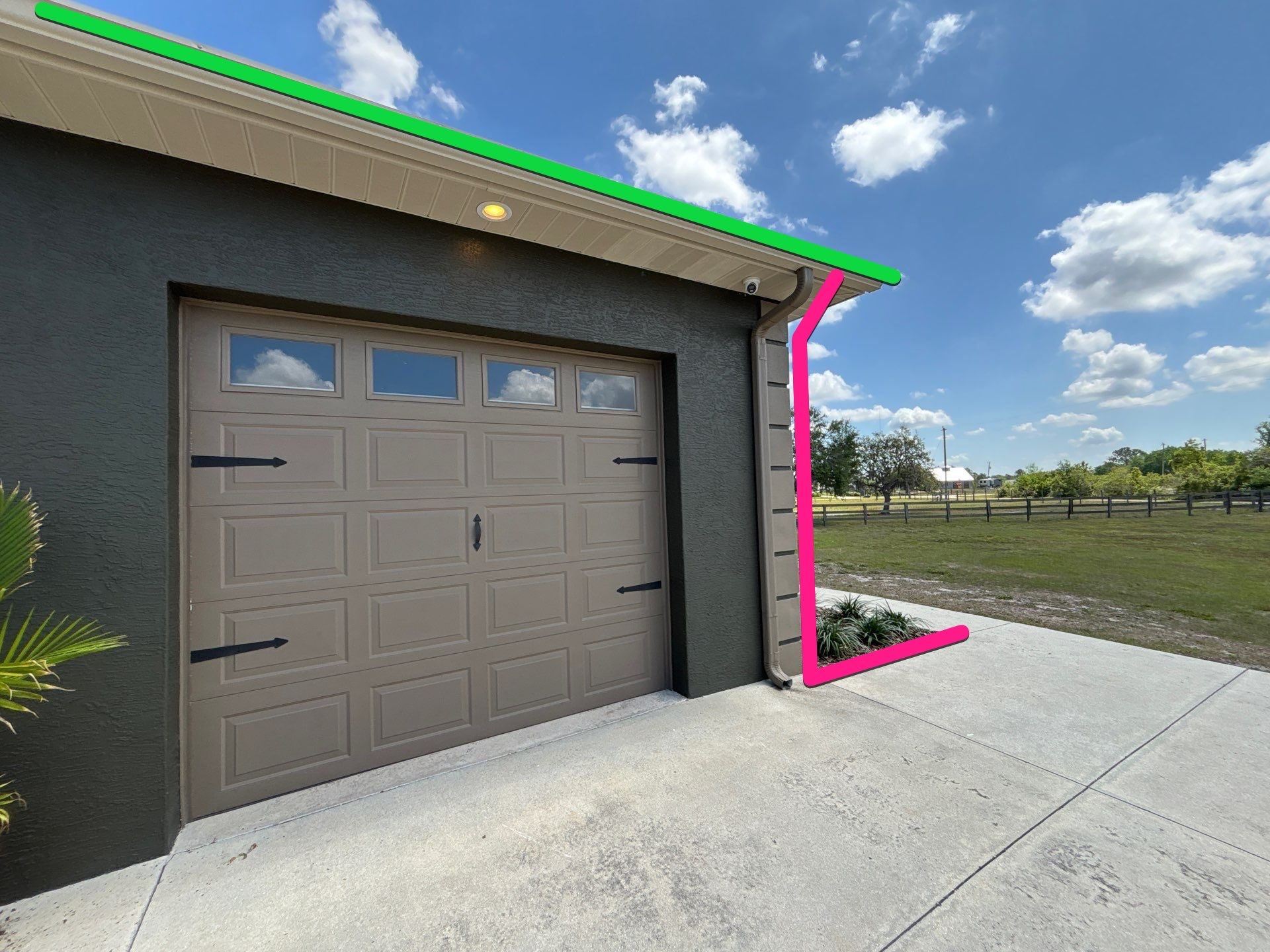  7-inch White seamless gutters and downspouts in Myakka City FL by Gutter Professors