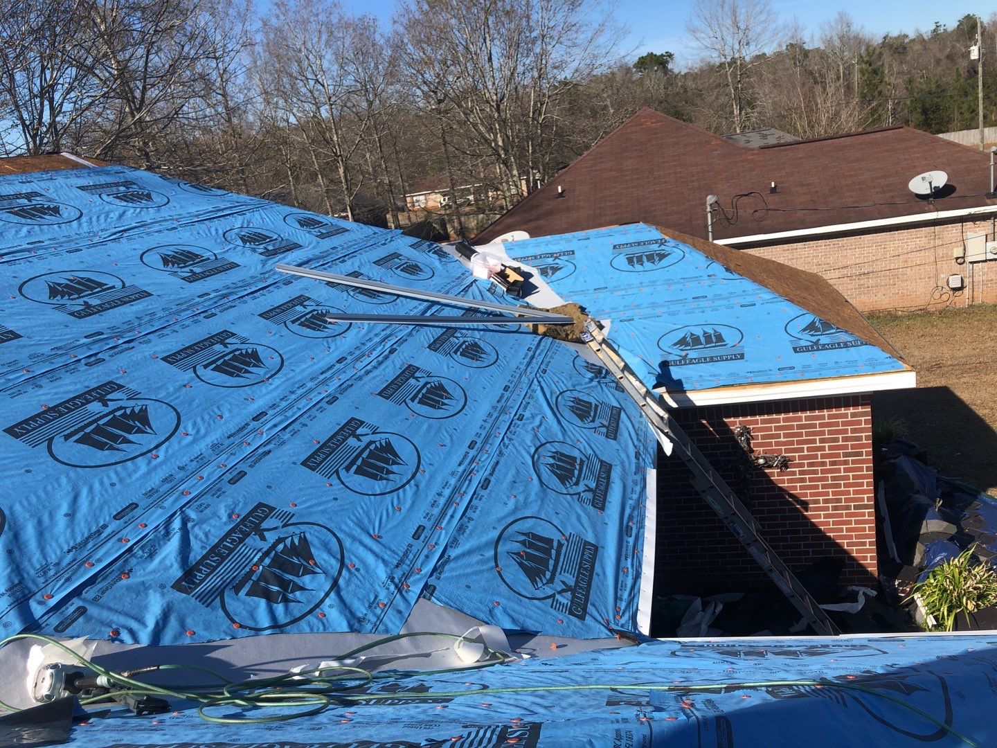 Residential Roofing Installation using Roof Replacement by American Roofing & Construction LLC