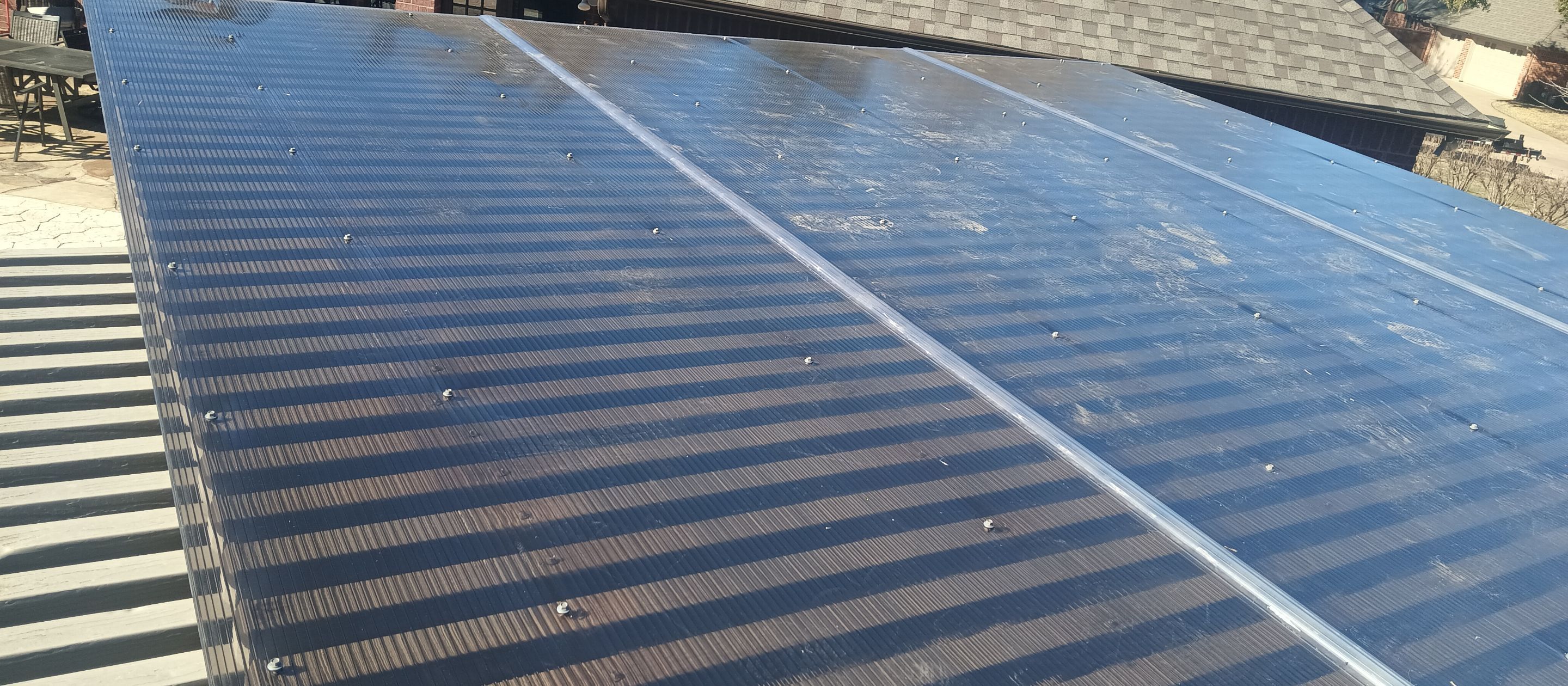 Polygal twin wall roofing system using 8mm bronze twin wall polygal by Grizzly Fence And Patio
