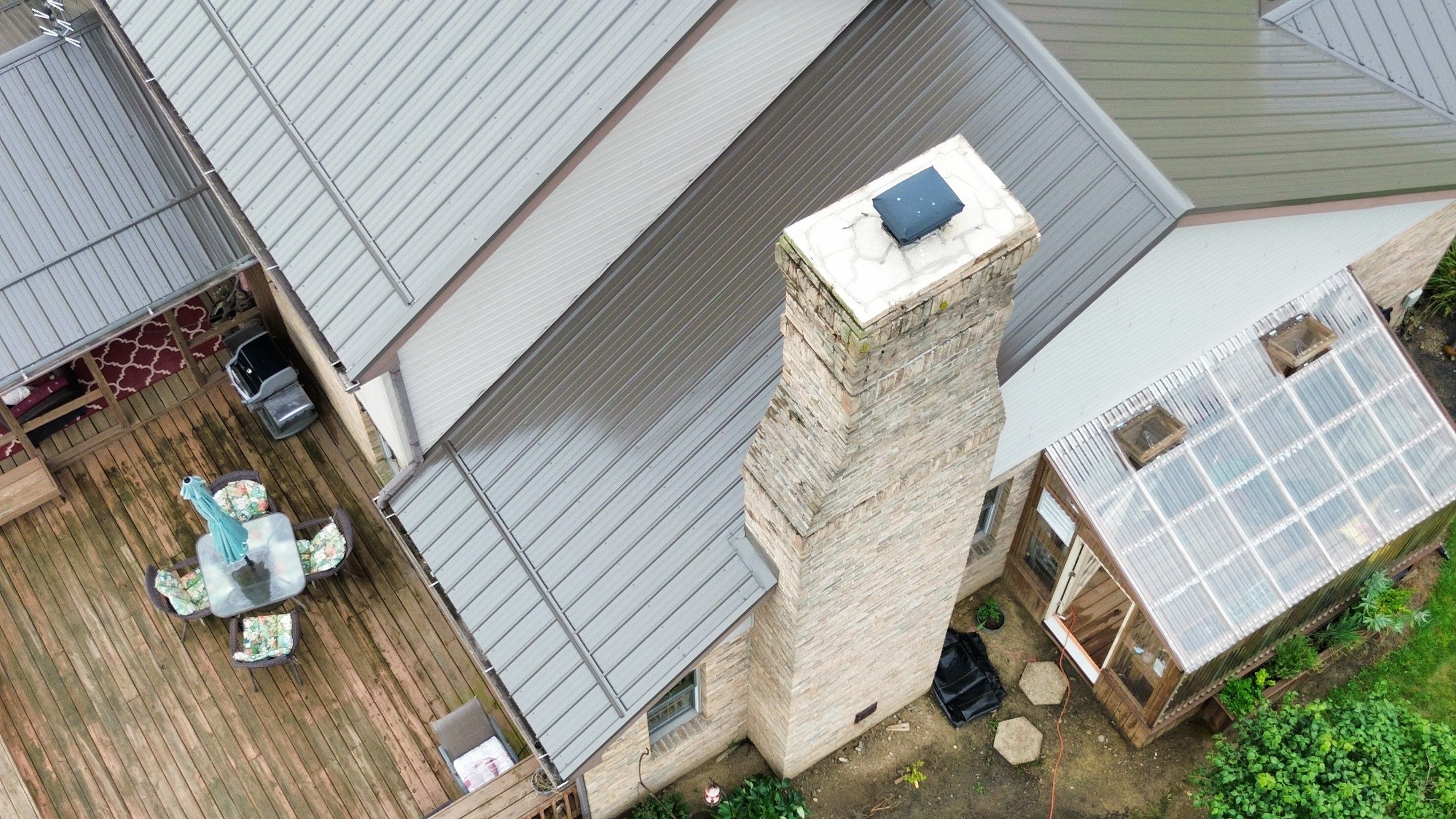 Residential Roofing Installation using Performance Panel Metal - Burnished Slate by RoofX 