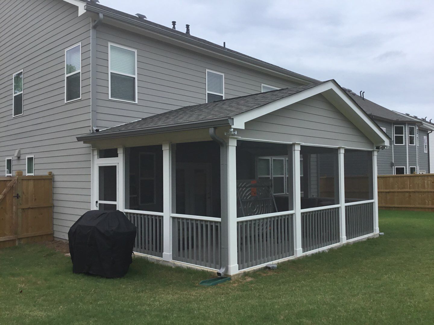 Screened Porch Addition With Gabled Roof and Tongue and Groove Ceiling by Swift Home Renovations