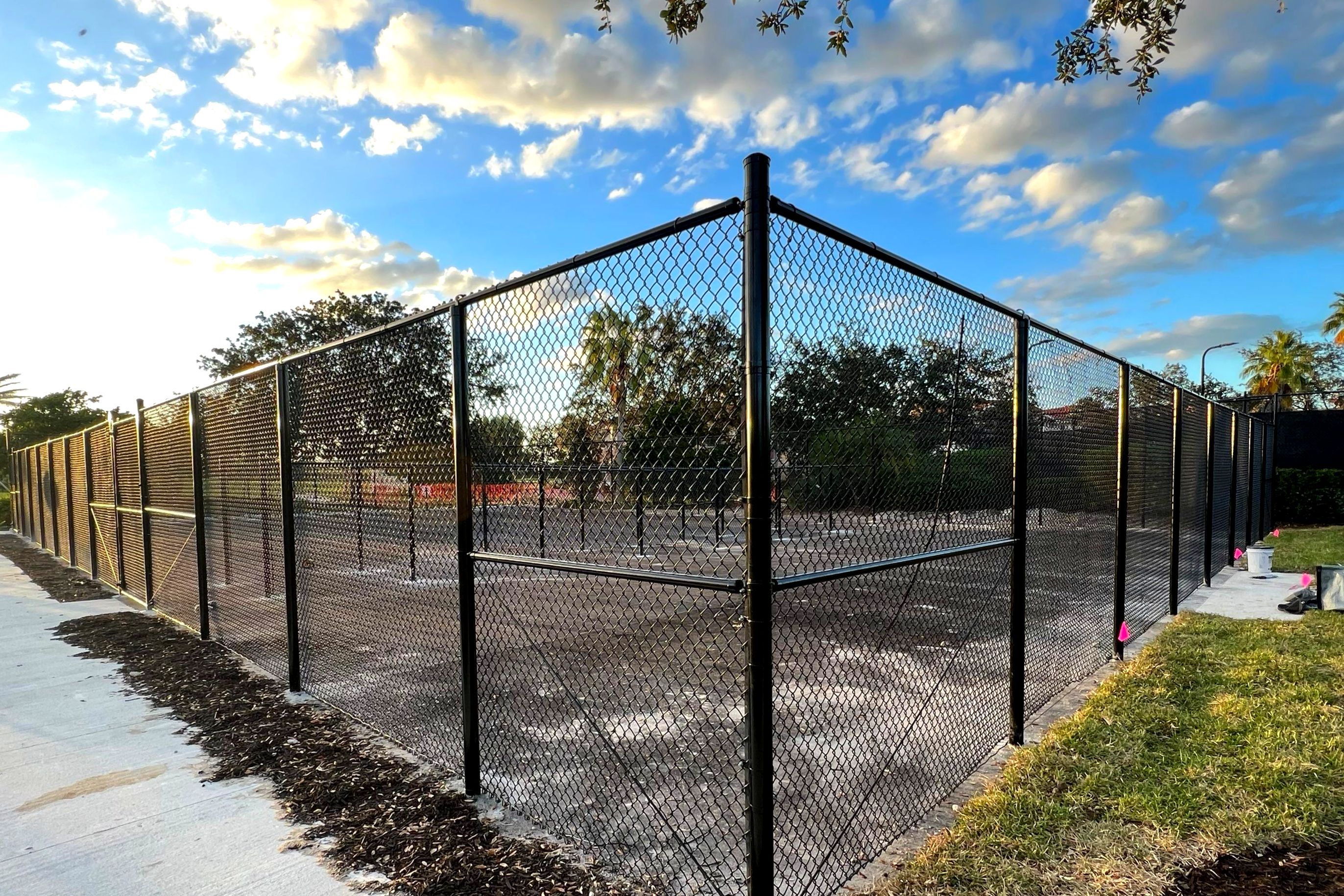 Chain-link Fence Installation using 8Ft Tall Black Chainlink Fence by Asap fence and gates, LLC