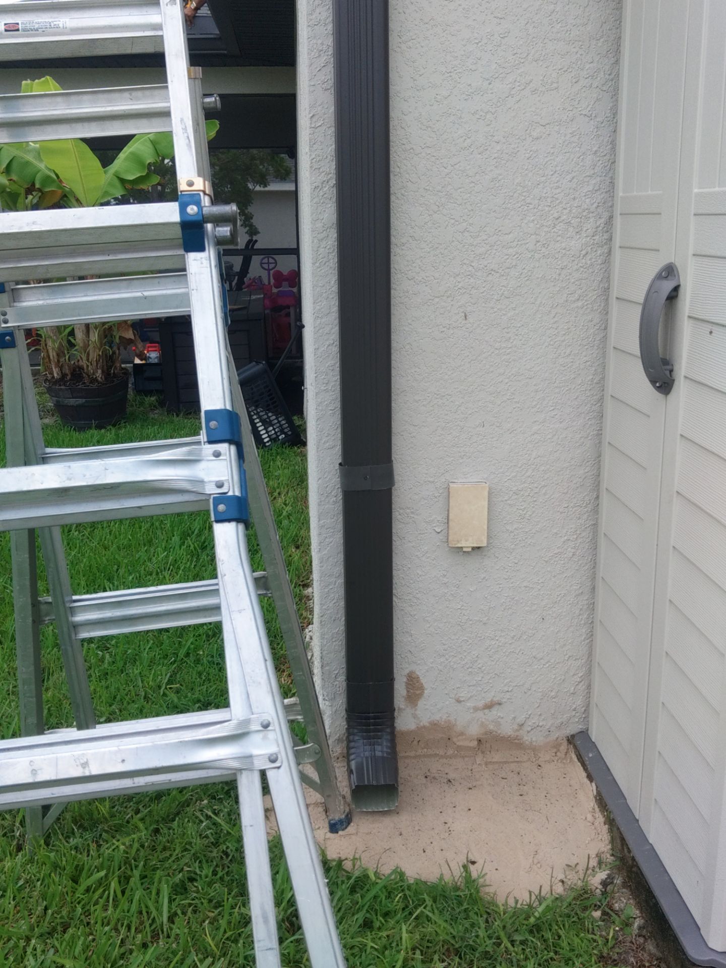Black Seamless Gutters using black seamless gutters in Cape Coral FL by Gutter Professors