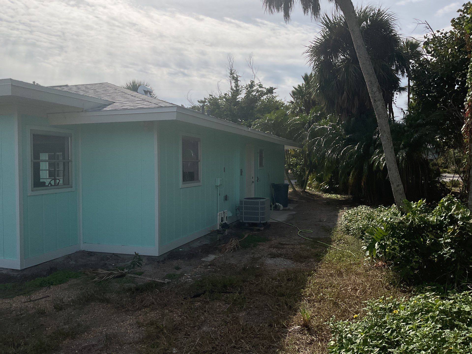 White Seamless Gutters Installation in Sanibel FL by Gutter Professors