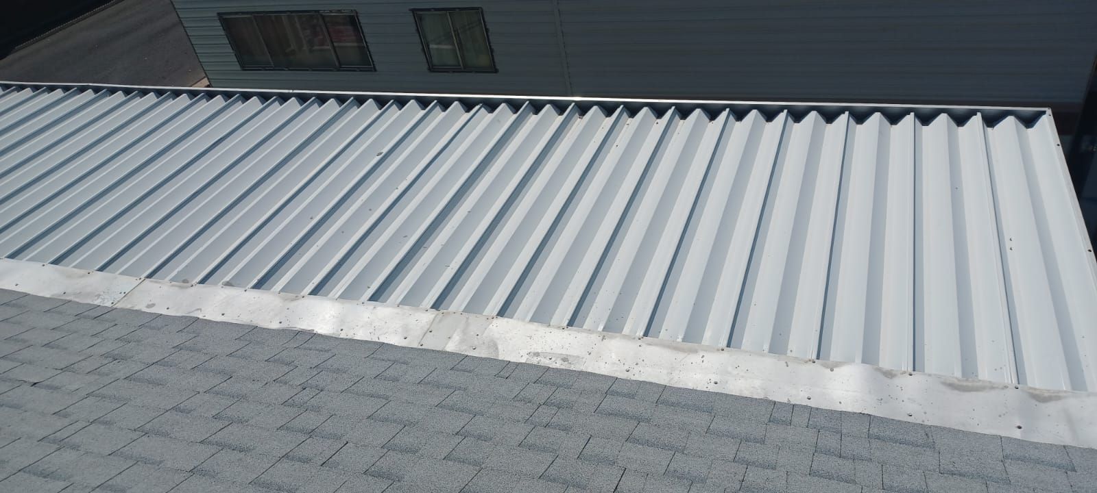 Estate Gray Shingles by Reimagine Roofing