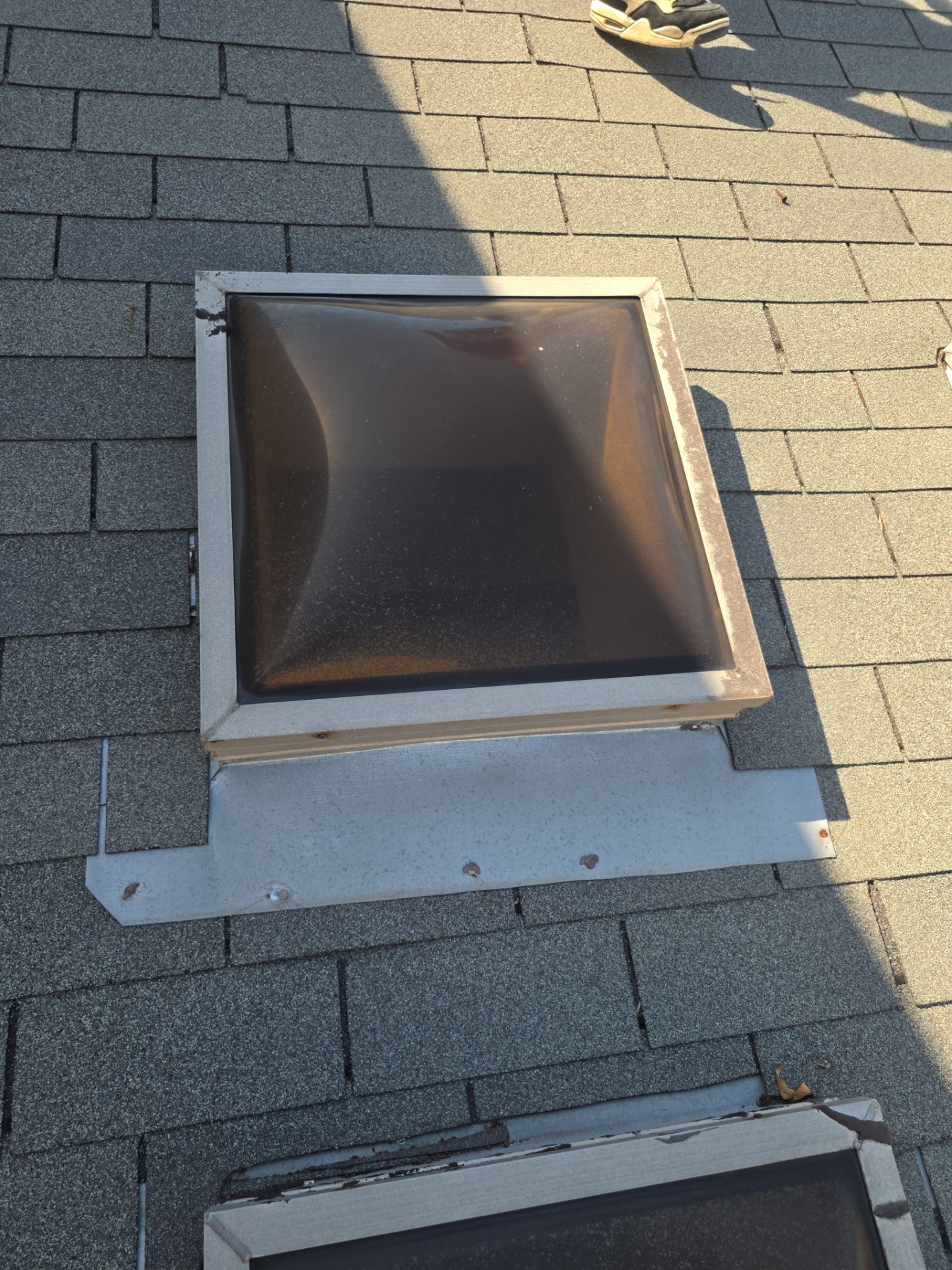 Asphalt Shingle Roof Repair and Skylight Sealing in Houston by One Legacy United