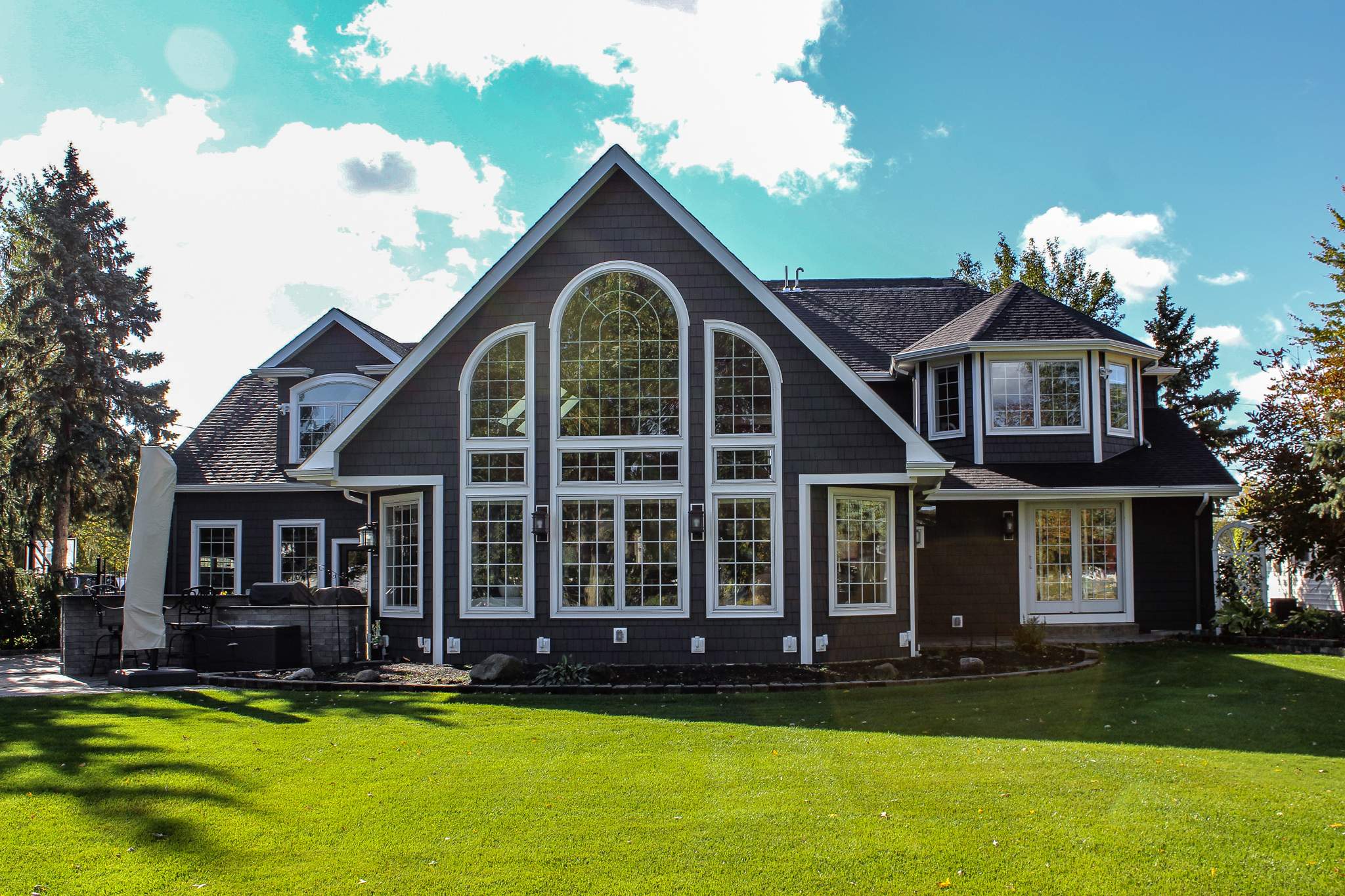 Exterior Renovations- Siding, Concrete, Railings, and Entry Door  by Ivy Lea Construction