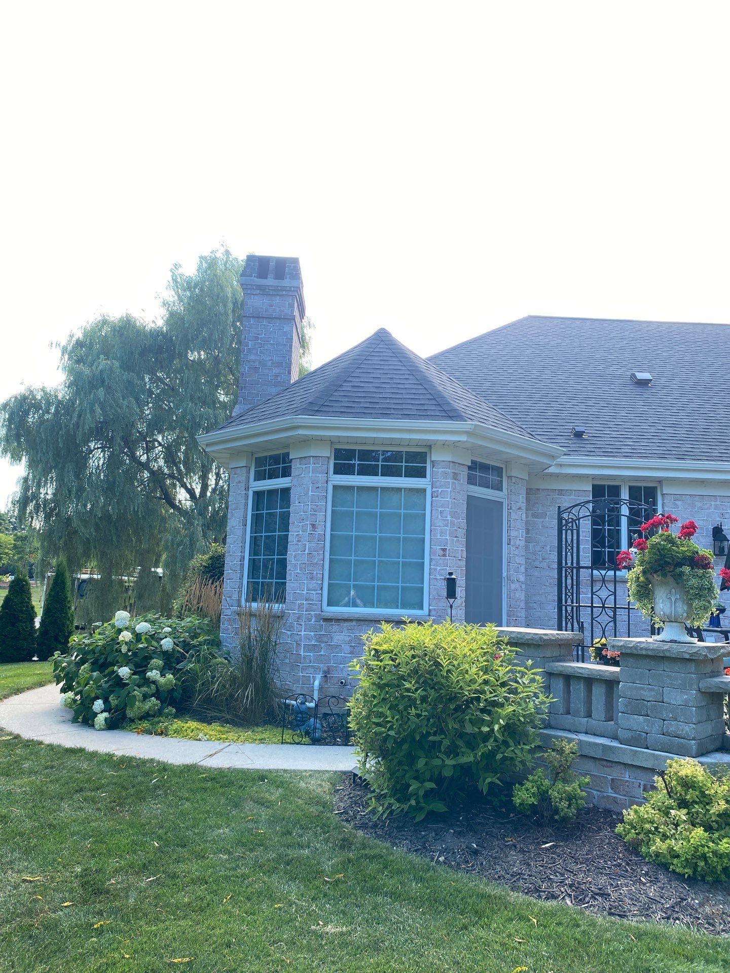 Classic Stucco Beauty  by Gellings Roofing & Siding