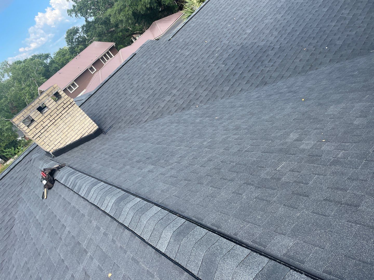 Residential Roofing Installation using Roof Replacement by American Roofing & Construction LLC