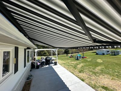 Sunesta Retractable Awning Installation for Concrete Patio in Gaylord