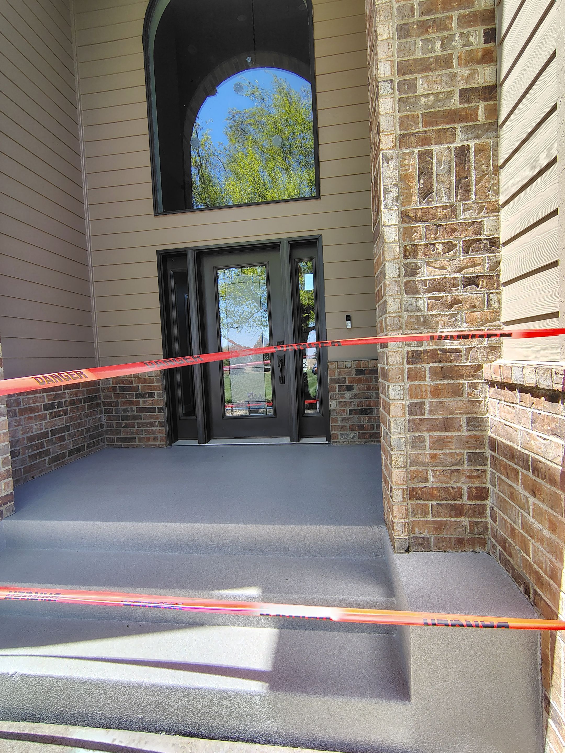 Front Porch Concrete Coating and Restoration in Harrisburg by Select Painting, Coatings & Garage Cabinets