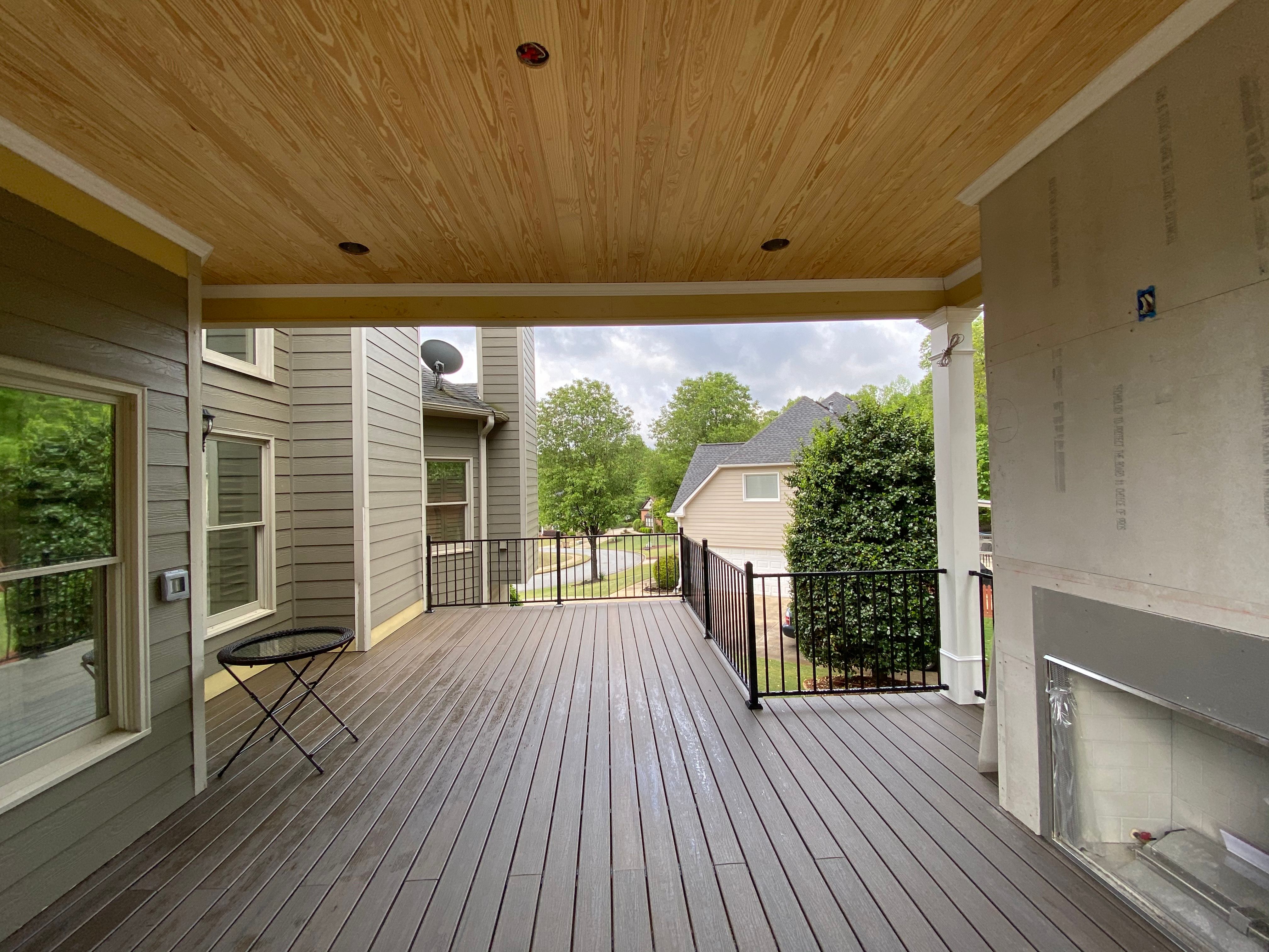 Covered Porch and Composite Deck Addition in Woodstock by Swift Home Renovations