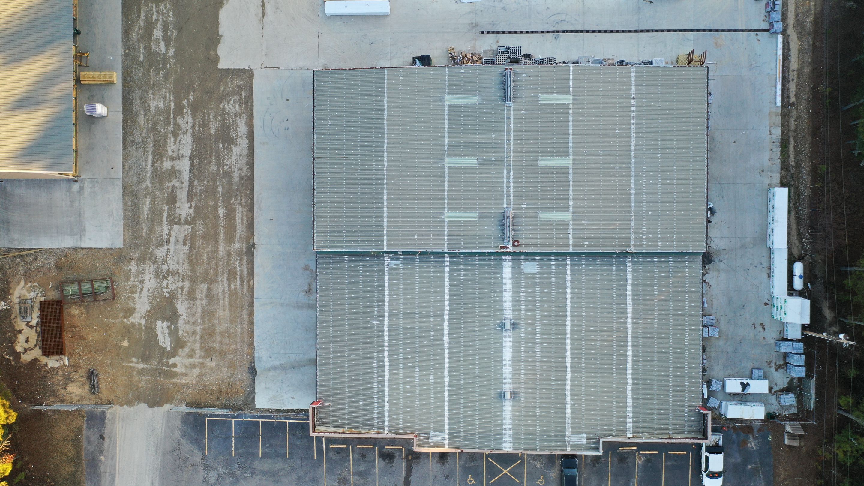 Commercial Roofing Installation using Aldocoat Coatings by Hostetler Roofing