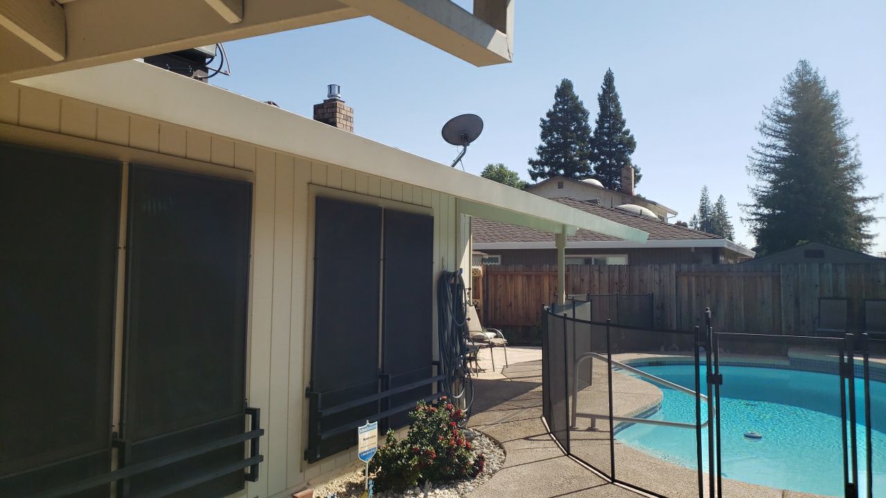 Roofing and Gutters to protect this home by Byers Enterprises 