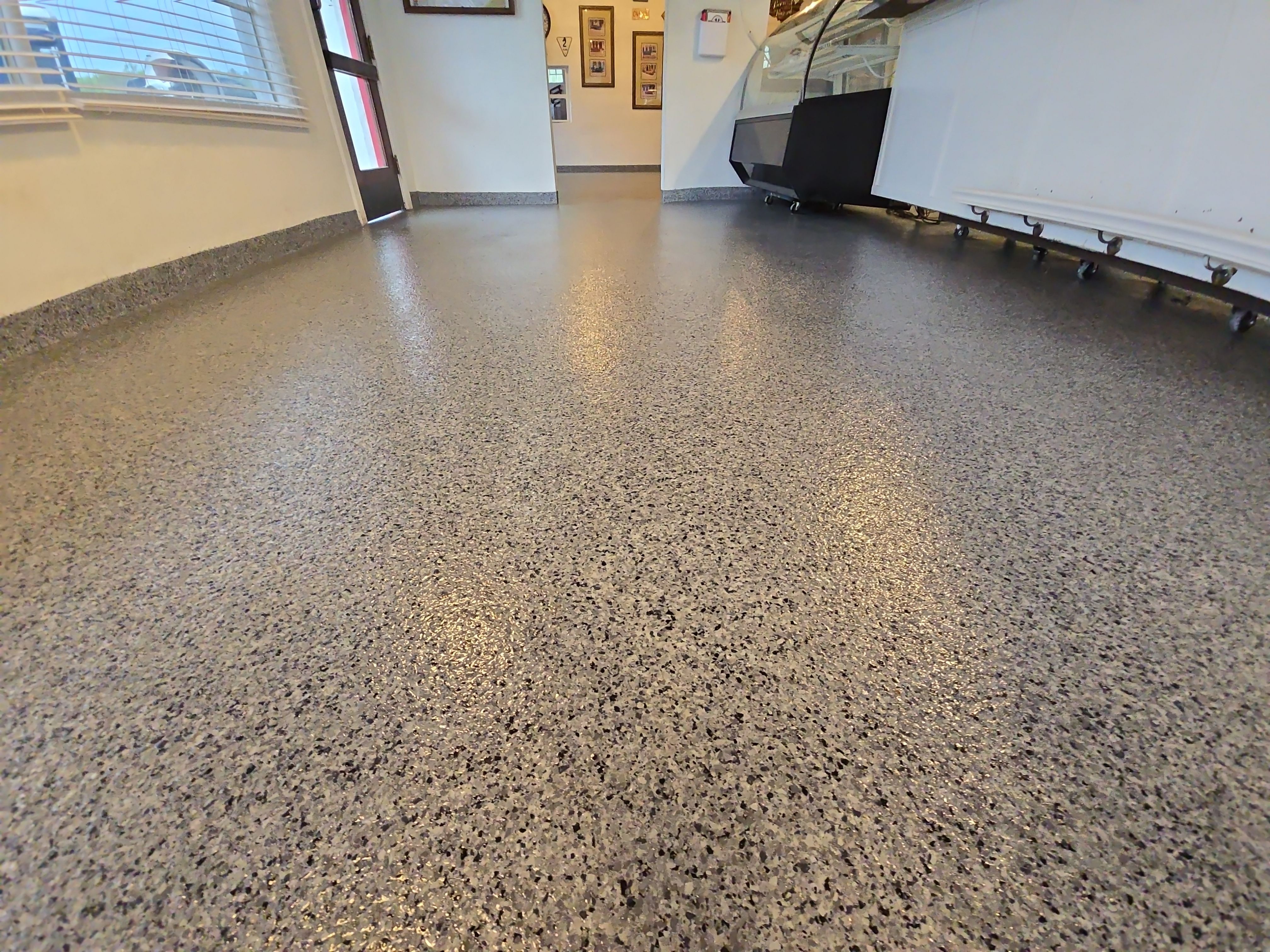 Check it out! Steelwheel Corner gets a new floor! by Elite Floor Solutions
