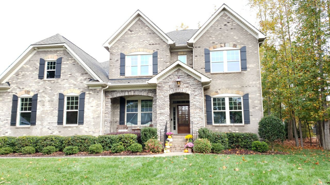 House Wash using cleaner by Power Wash Masters LLC