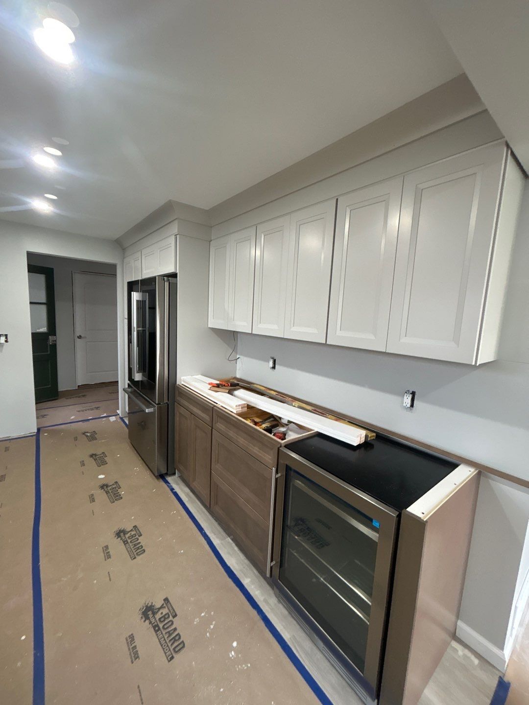 Interior Renovations, Kitchen Remodel, and Window Replacement by Ivy Lea Construction