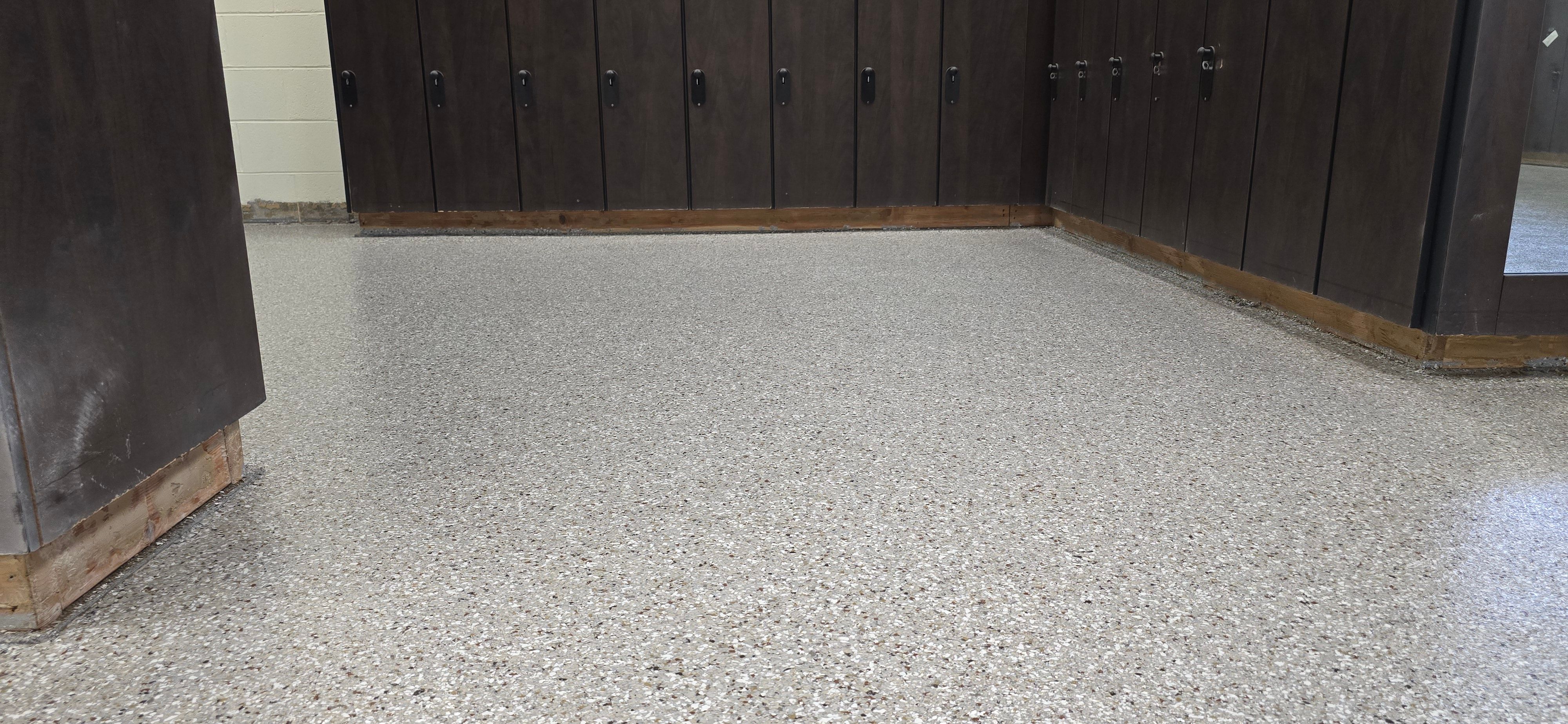 Gym Locker Room Upgrade Using Creekbed by Elite Floor Solutions