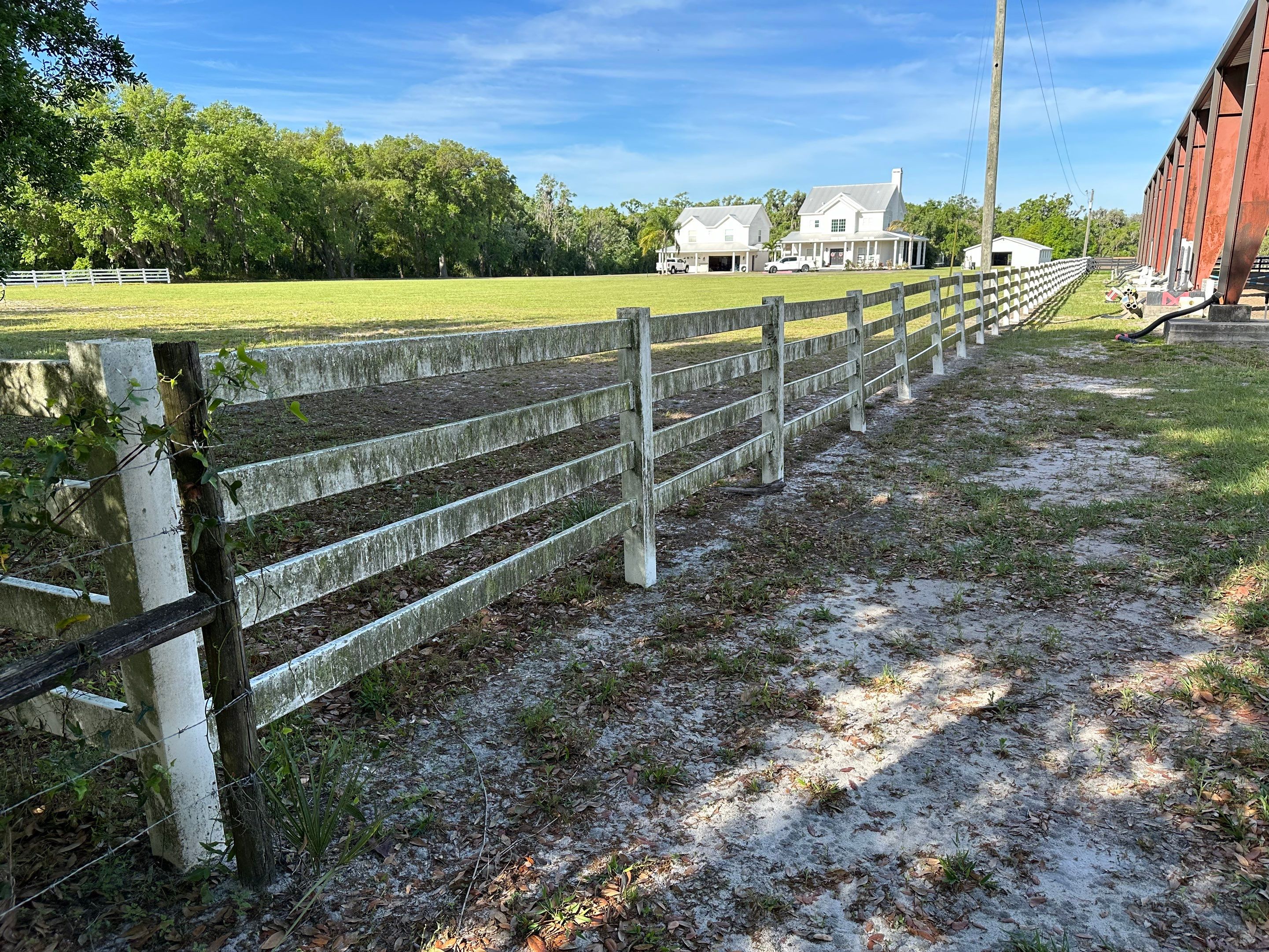 Vinyl Horse Fence & Concrete Pier Cleaning at Lesley Cox Equestrian, Parrish, FL | Sunshine AquaWash by Sunshine AquaWash