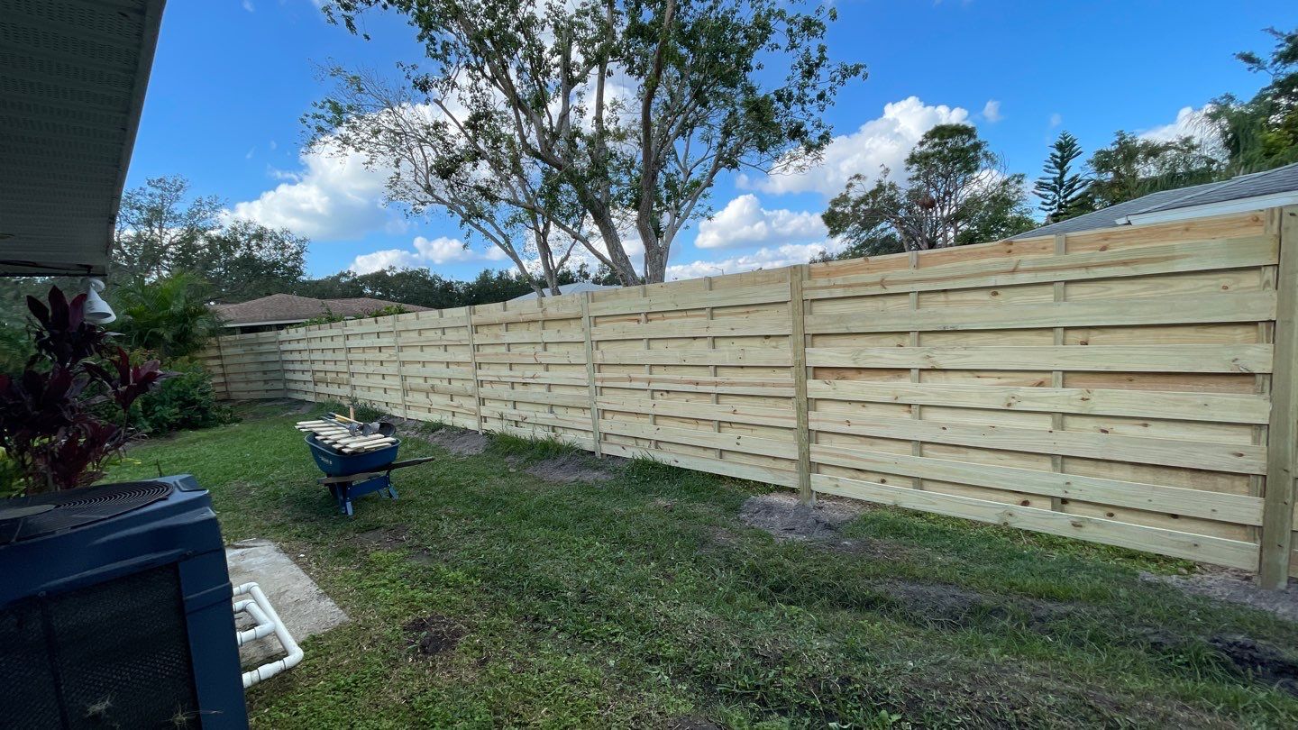 Wood Fence Installation using Shadowbox Wood Fence by Asap fence and gates, LLC
