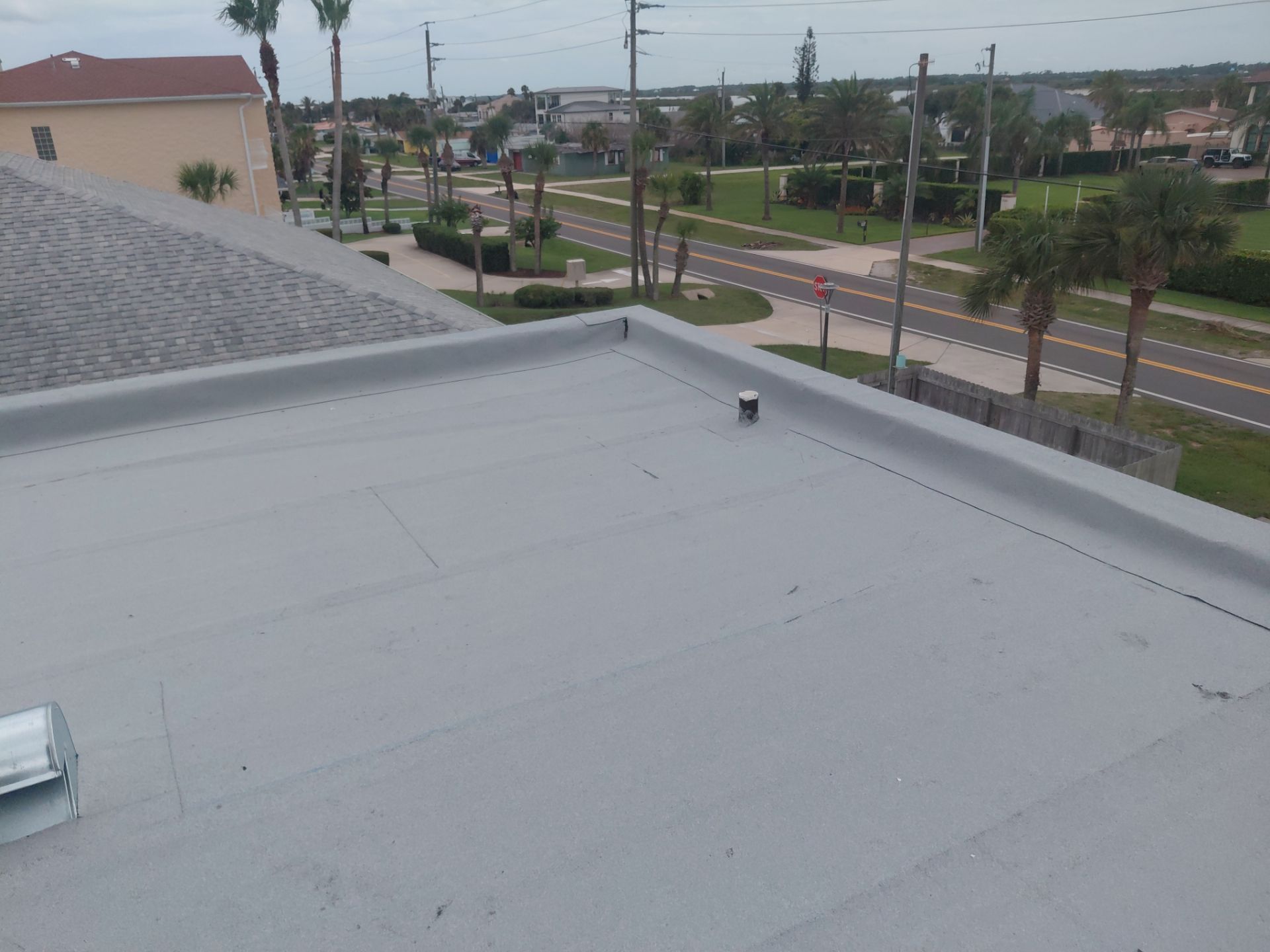 Flat Reroof Replacement Daytona Beach Shores FL by Pinnacle Roofing Group