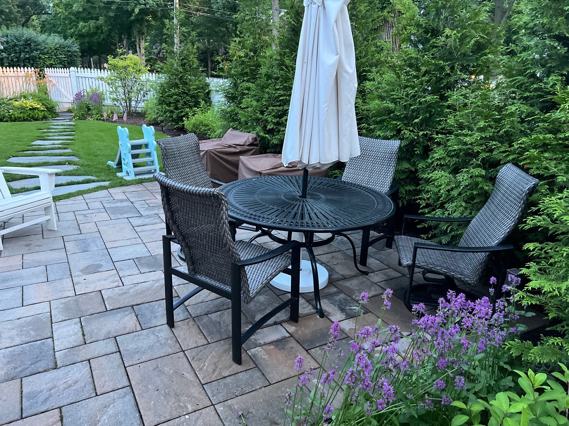 concrete cleaning using Algaecide, soft wash soap by Northern Power Washing LLC.