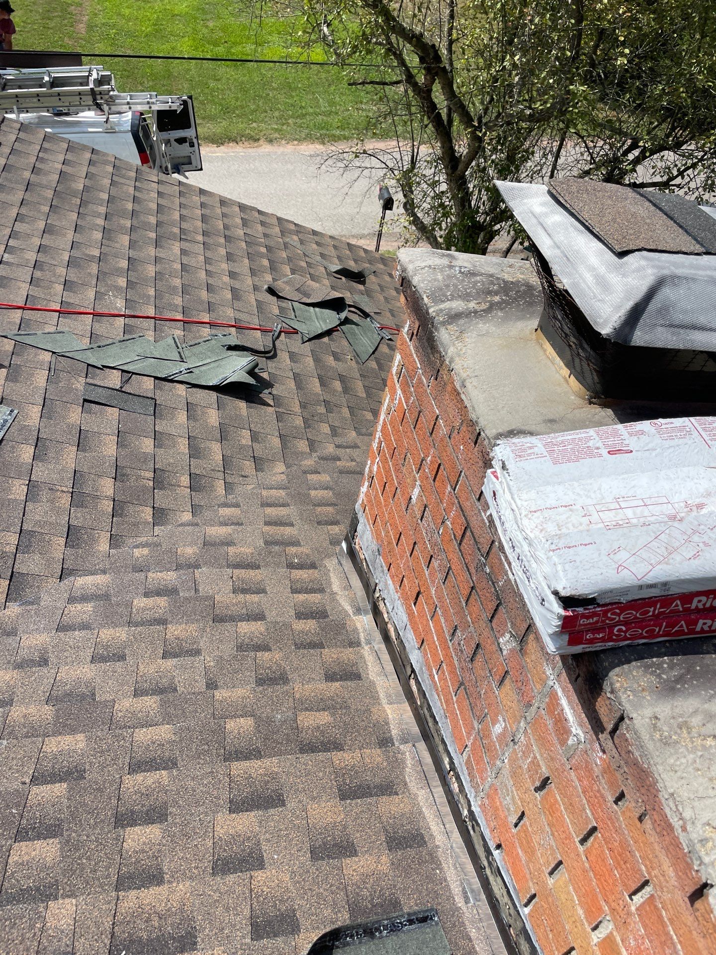 Residential Roofing Installation using GAF TImberline HDZ Hickory by Rainstoppers Roofing