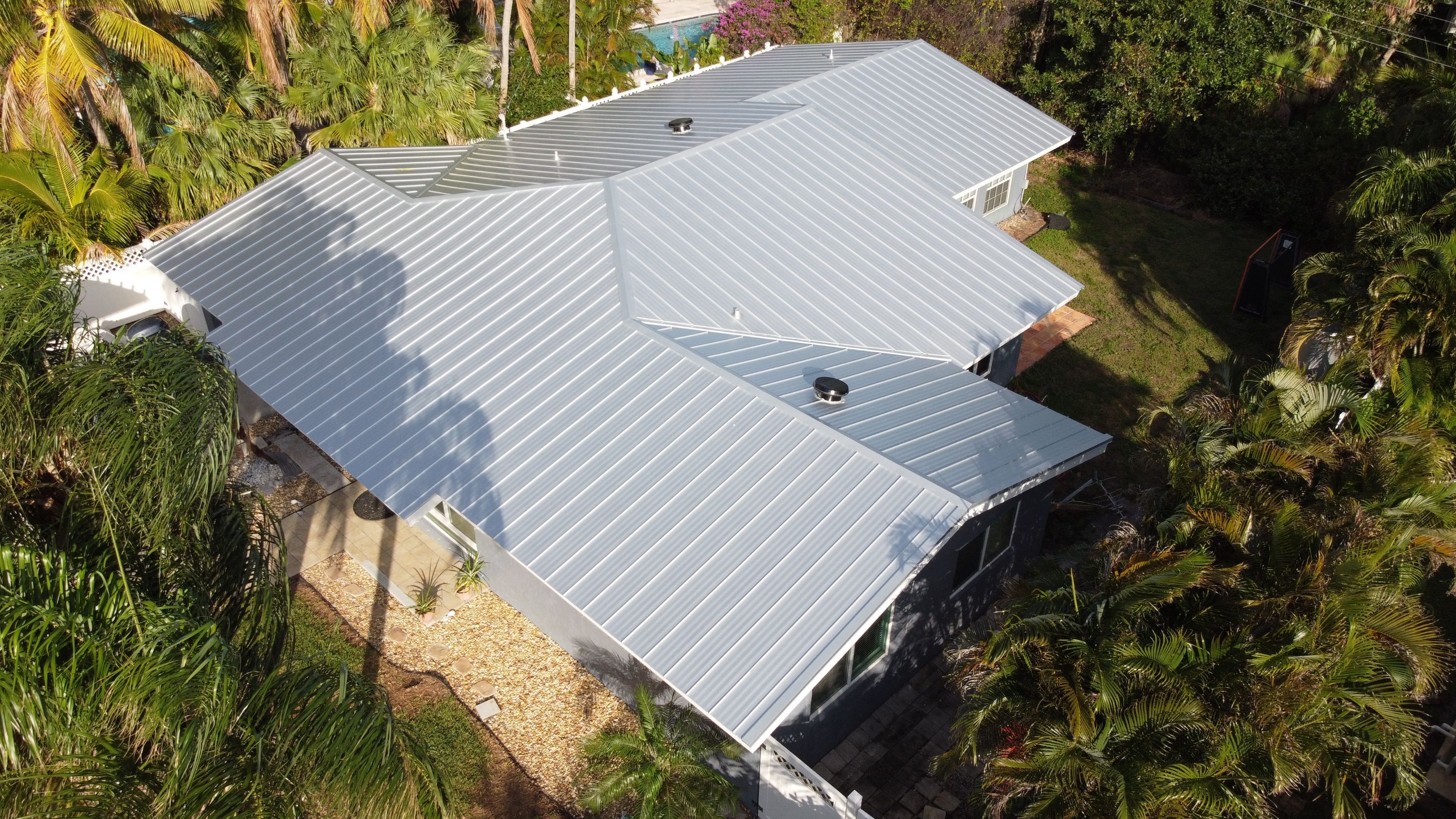 Residential Roofing Installation using 1" Nail strip metal roof by BLUES BROTHERS CONSTRUCTION CORP