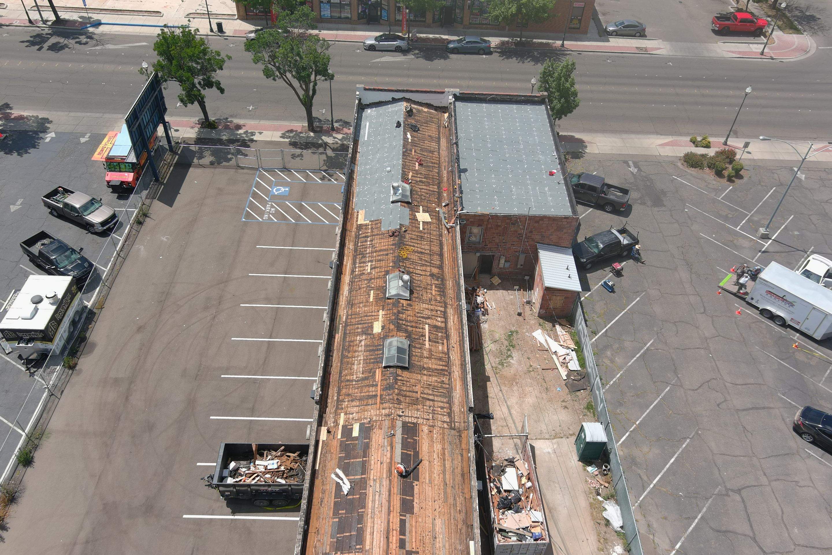 Commercial Roofing Installation using Conklin BenchPly system with PUMA top coat (imbedded fabric system) by Straight Edge Roofing Inc