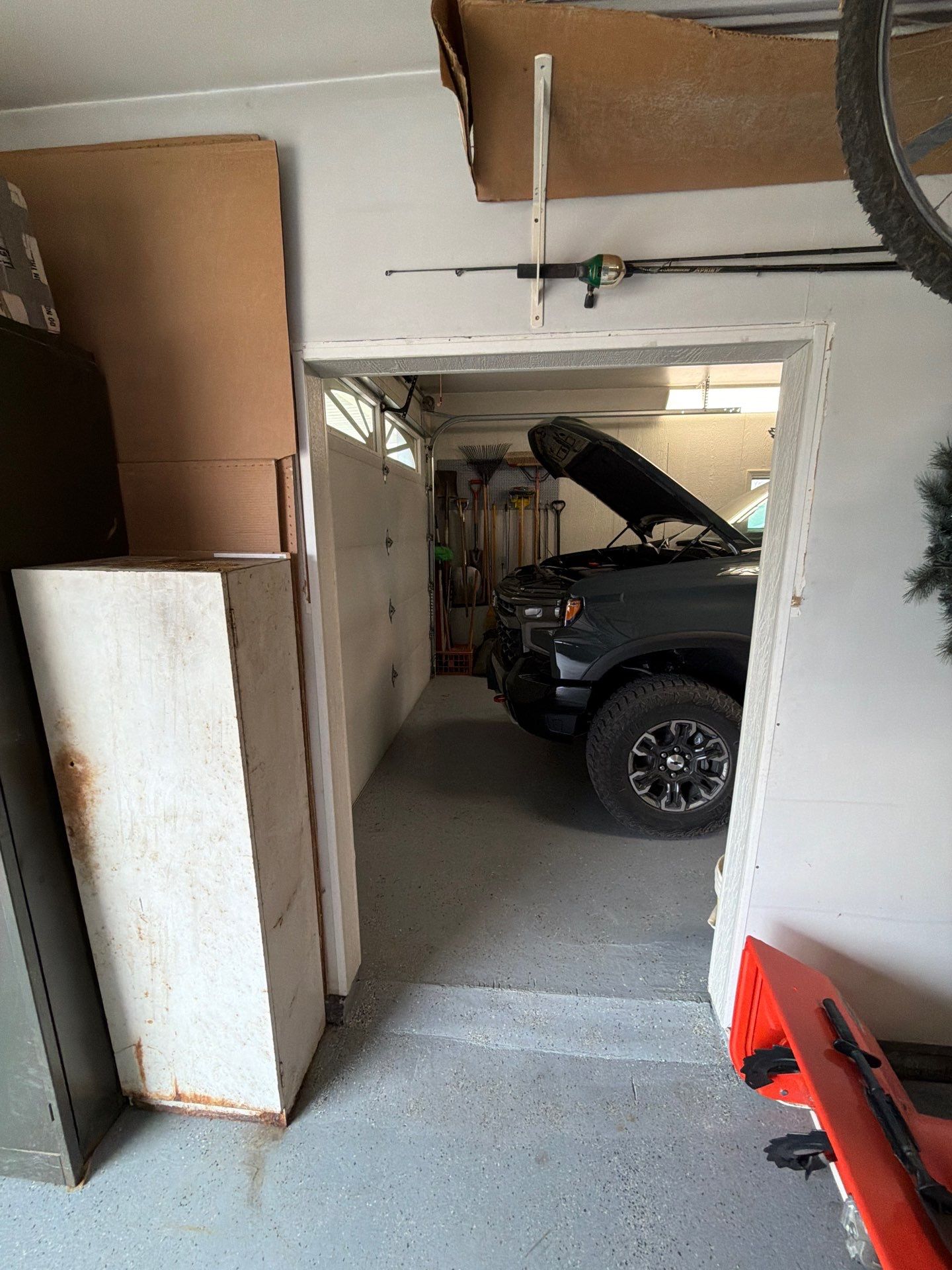 Custom Grey Flake Epoxy Garage Floor Installation in Remsen by Select Painting, Coatings & Garage Cabinets