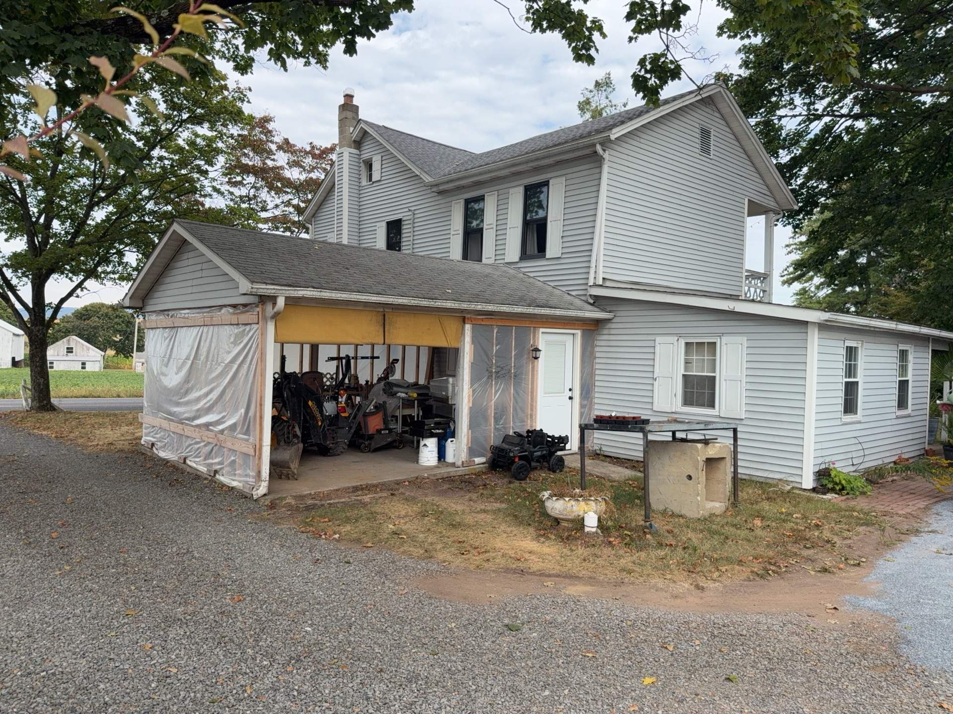 Carport Enclosure with Metal Siding and Roofing in Halifax by Esh Builders